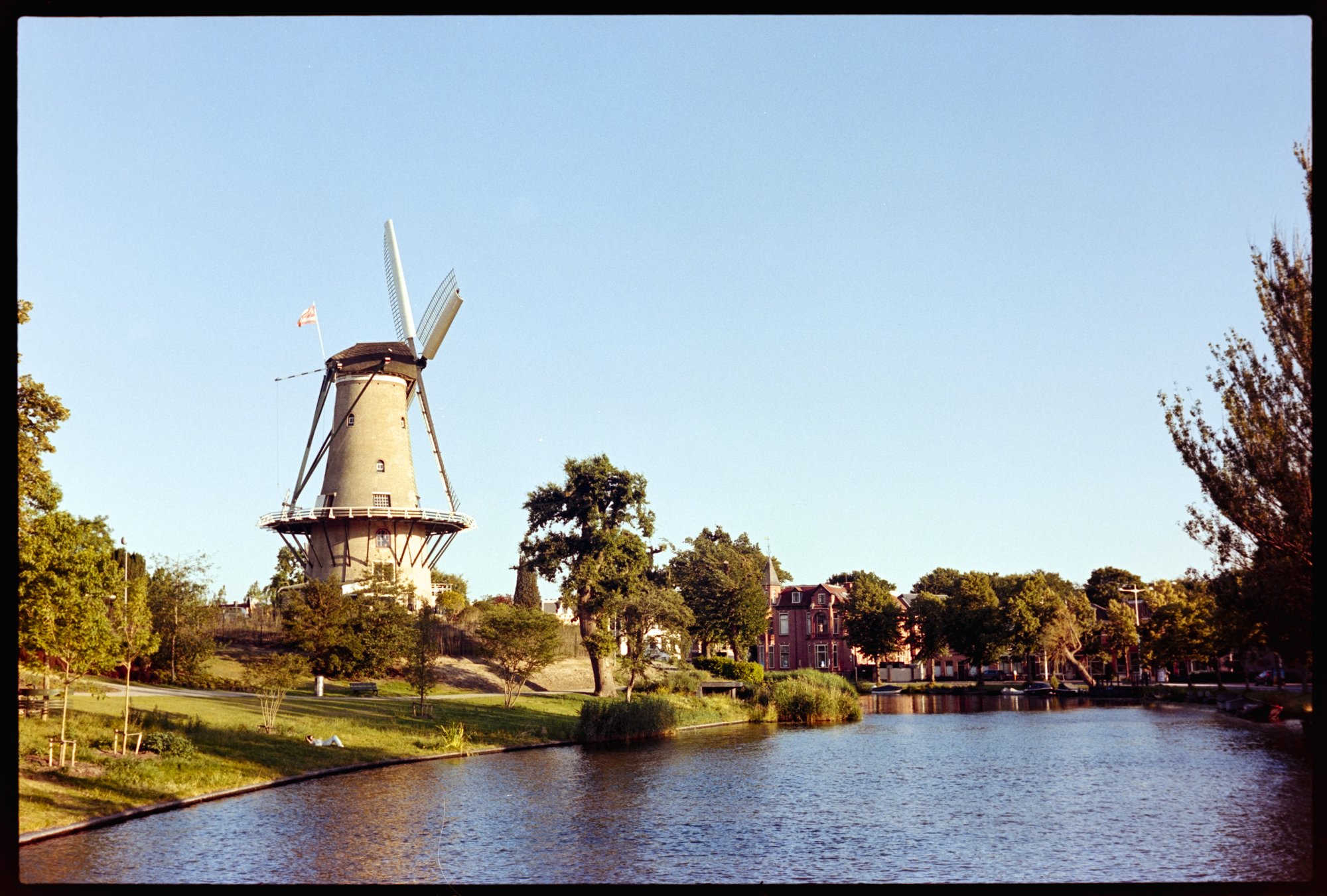 The windmill in the city center of Alkmaar presides over the canal.