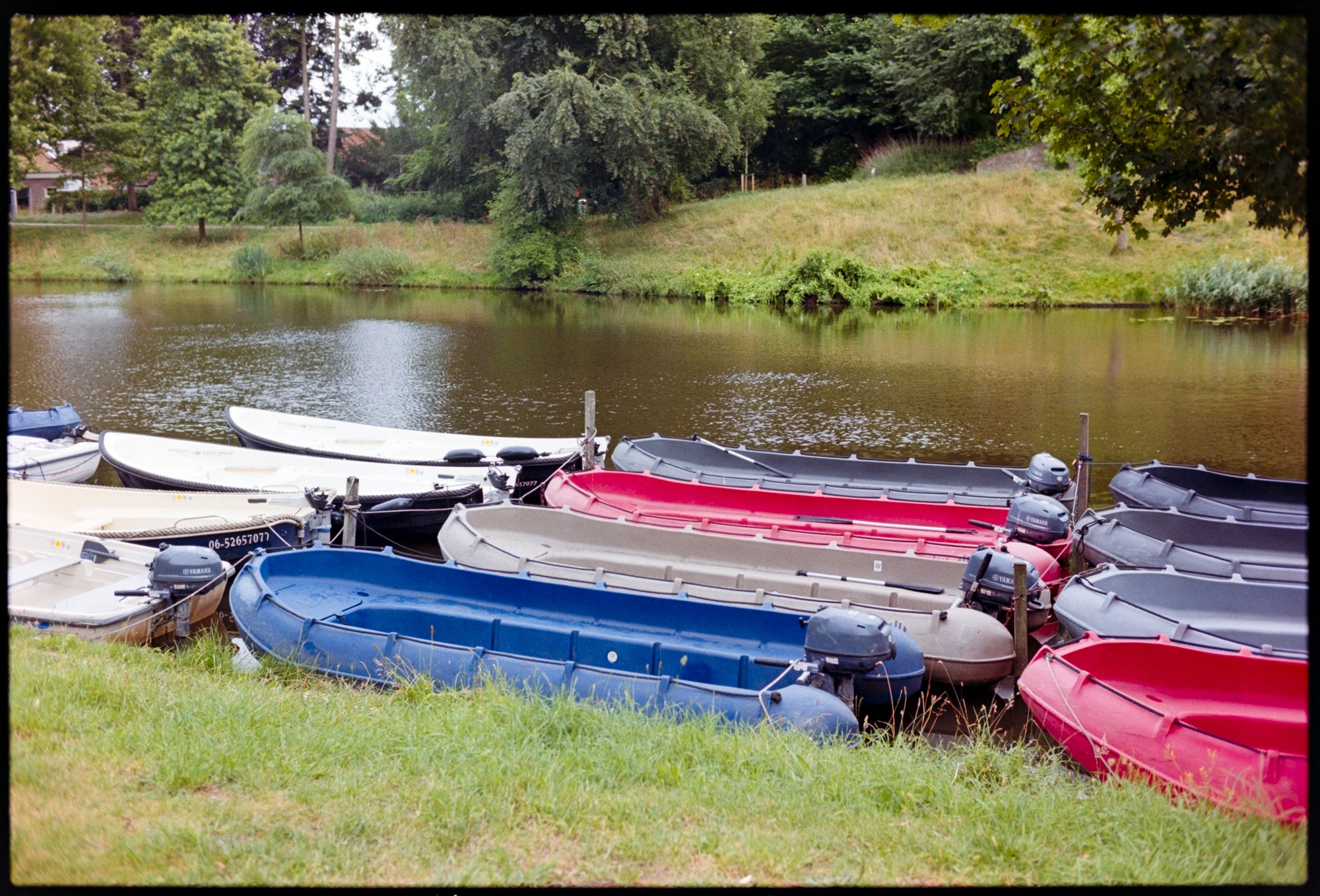 Rental boats on the canal in Alkmaar, the Netherlands.