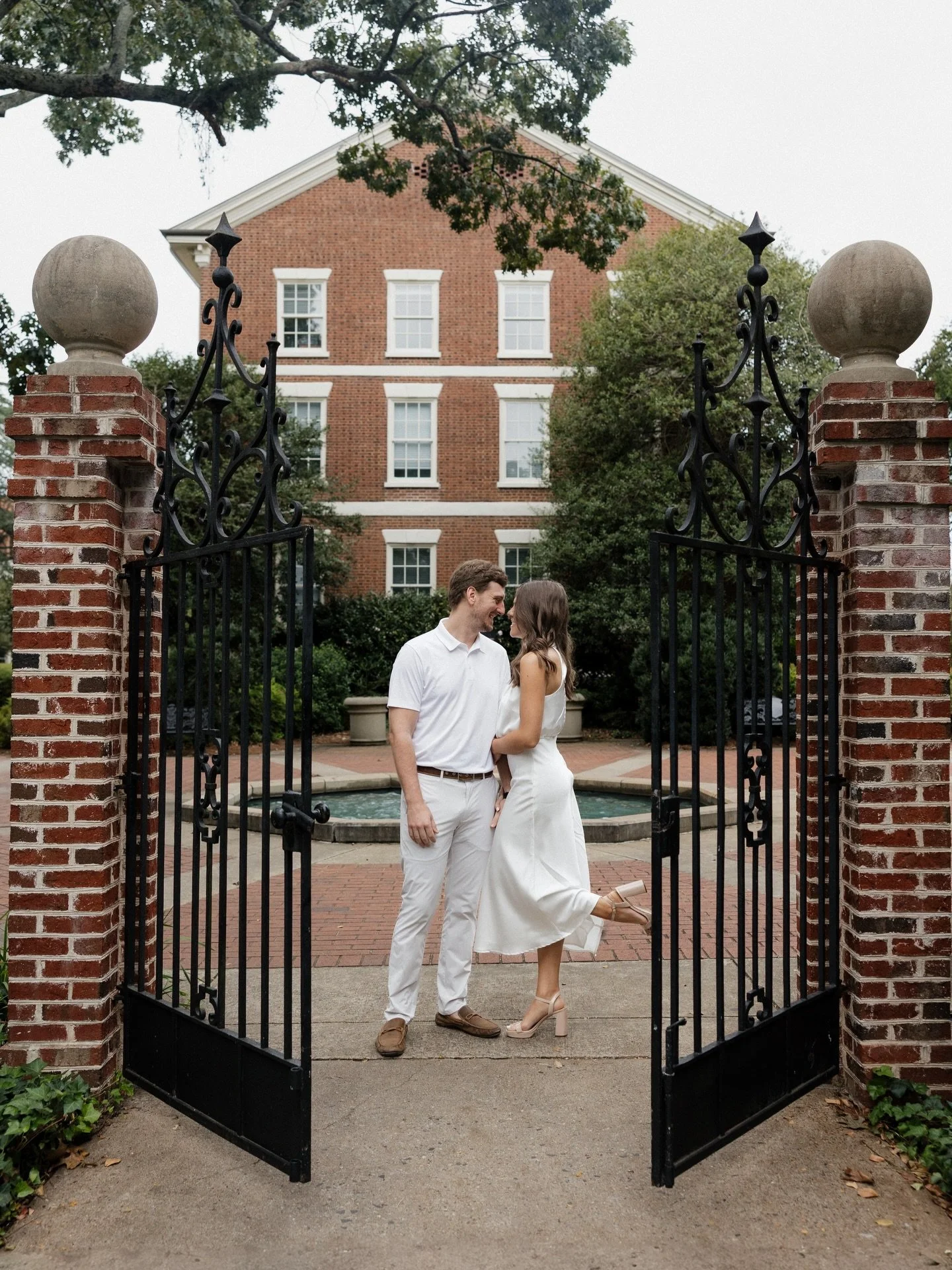 There&rsquo;s a certain elegance to engagement photos in places that naturally feel calm and beautiful. Wandering the UGA campus with these two gave us the perfect mix of classic architecture, soft light, and clean, timeless scenery &mdash; the kind 