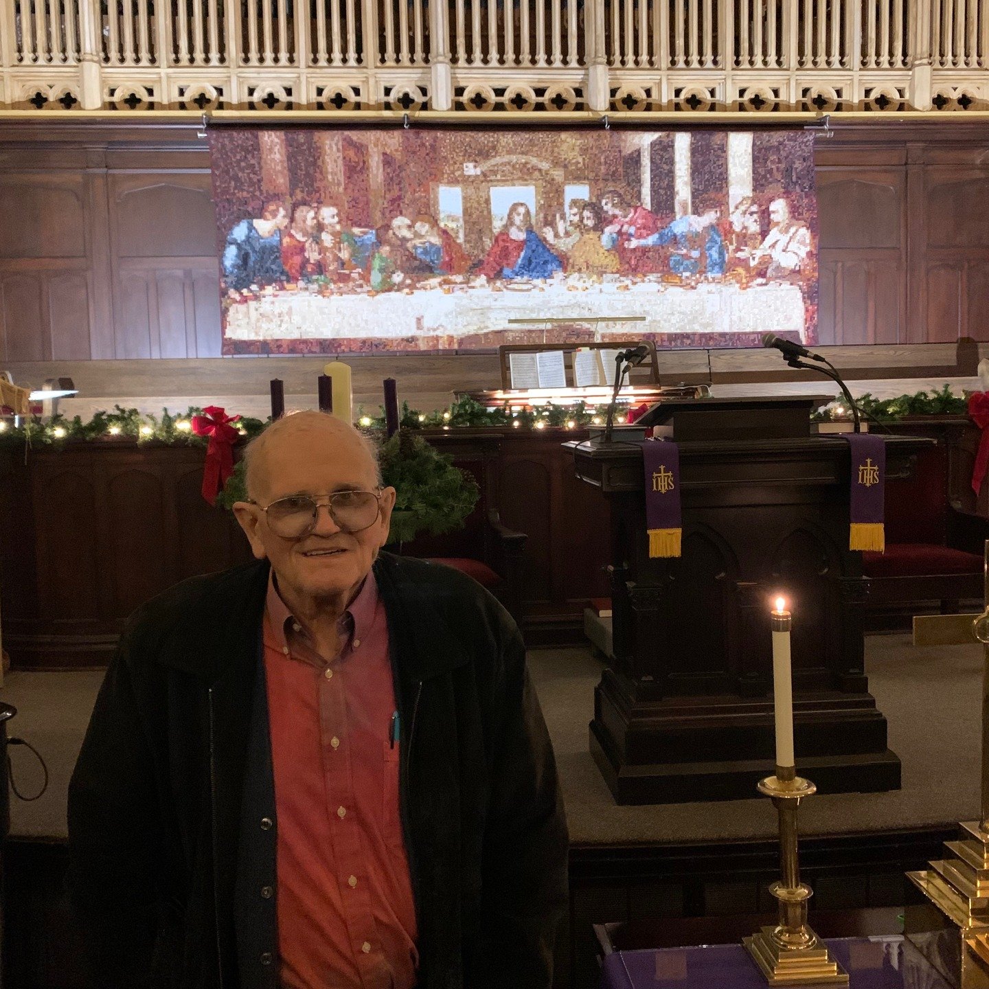 Dr. Don Locke with the Supper Quilt he made. It often hangs in the church during Bethlehem Revisited.