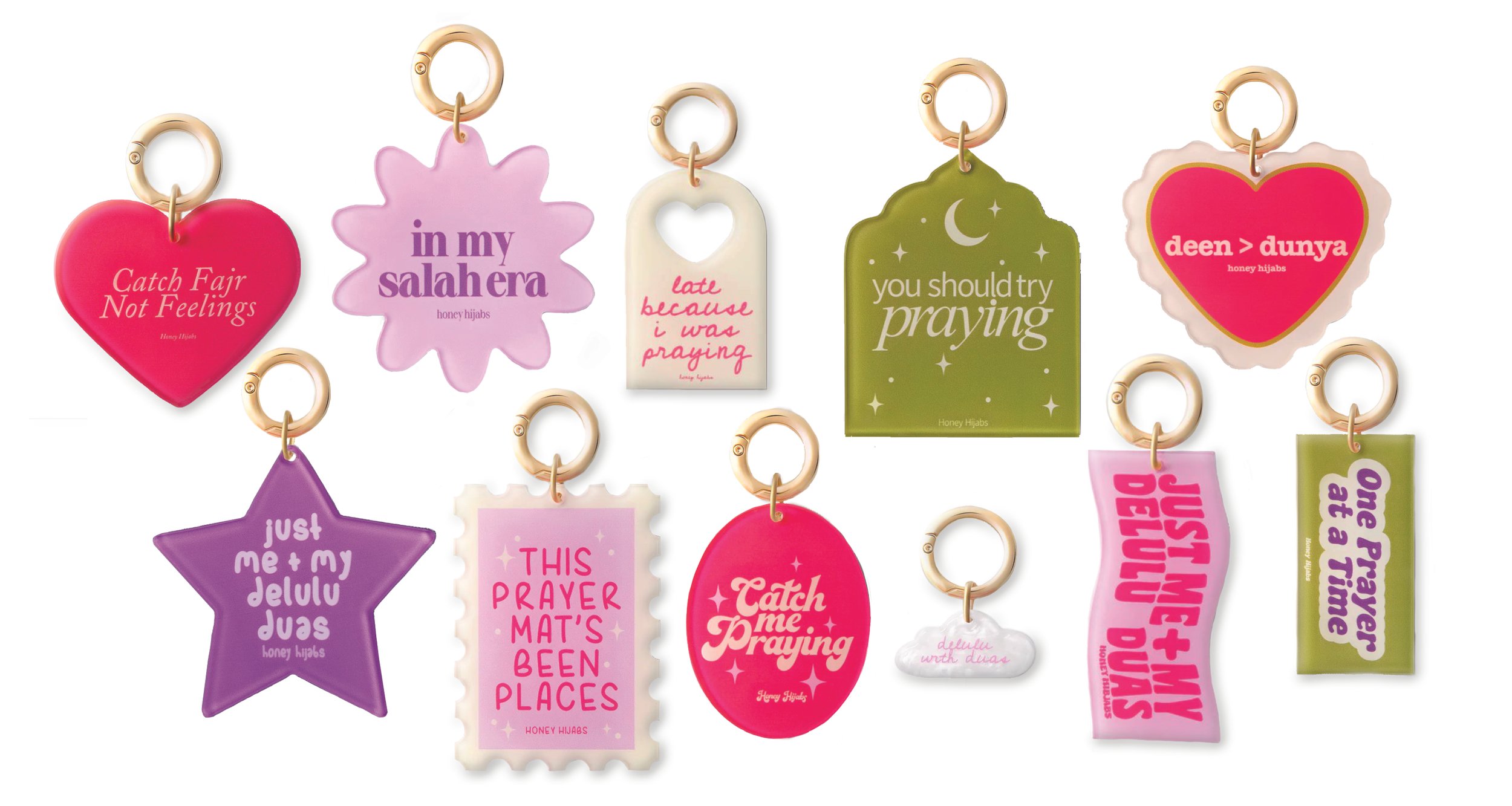 Collection of keychains of stars, and floral shapes, with messages like 'One Prayer at a Time,' 'Catch Fair Not Feelings,' 'just me + my delulu duas,' 'in my salah era,' 'late because I was praying,' 'Catch Me Praying,' 'you should try praying,' 'thi