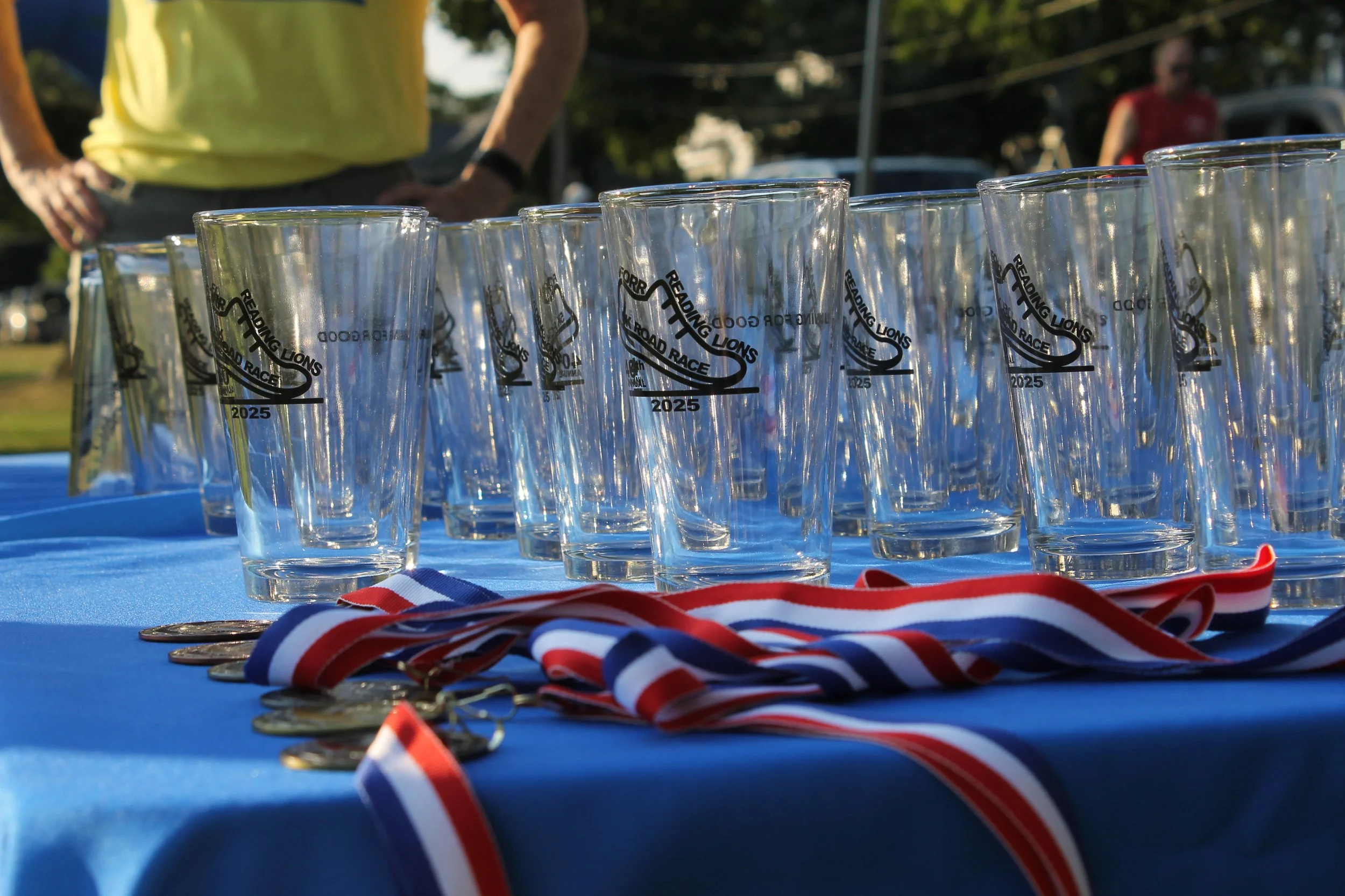 Top 3 finishers in each age category received a pint glasses.