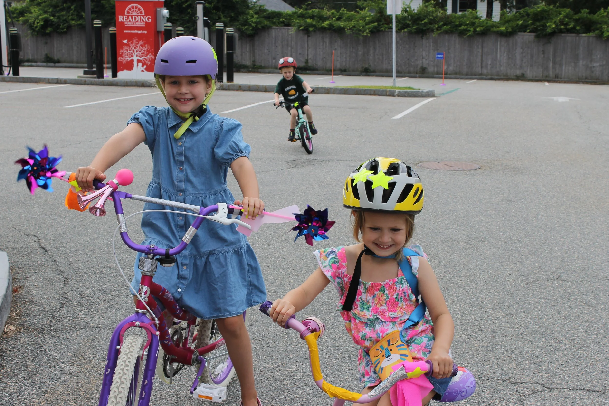 Sisters Amelia (left) and Eliza (right) pose on their decorated bikes at the Bike Rally on August 14, 2025.