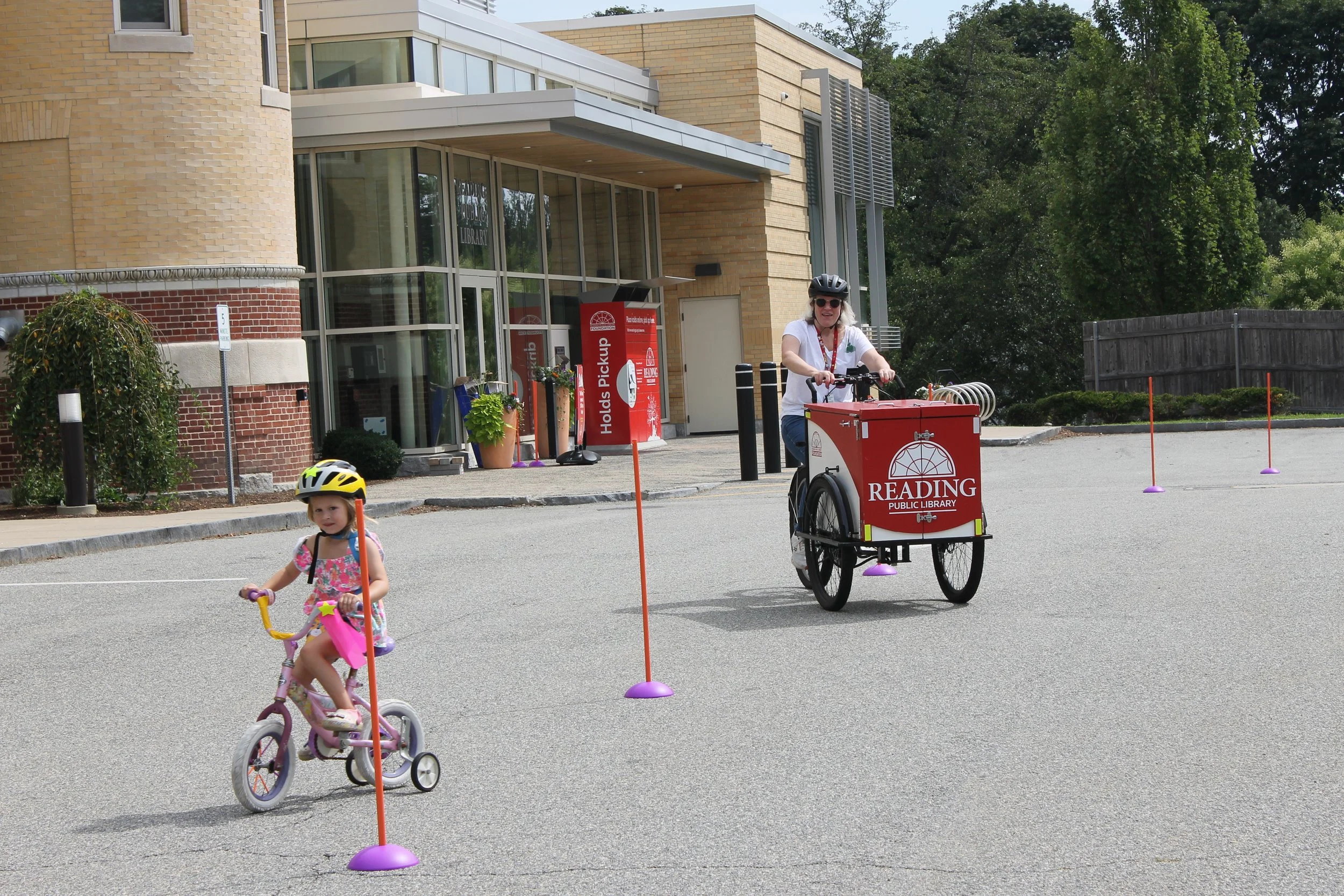 Participant Eliza and RPL Staff Cate Zannino rounding out the parade at the Bike Rally on August 14, 2025.
