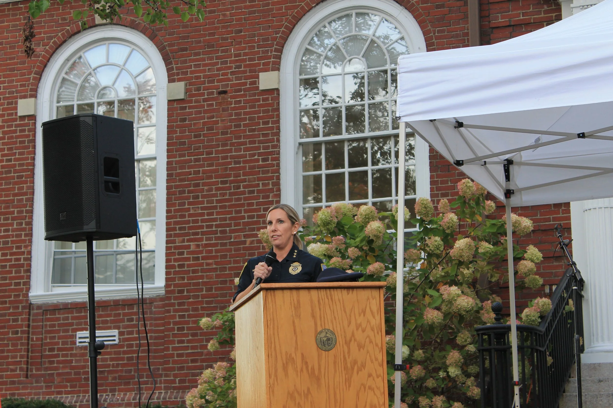 Deputy Police Chief Christine Amendola speaking at the A Time to Gather event held on September 17, 2025.