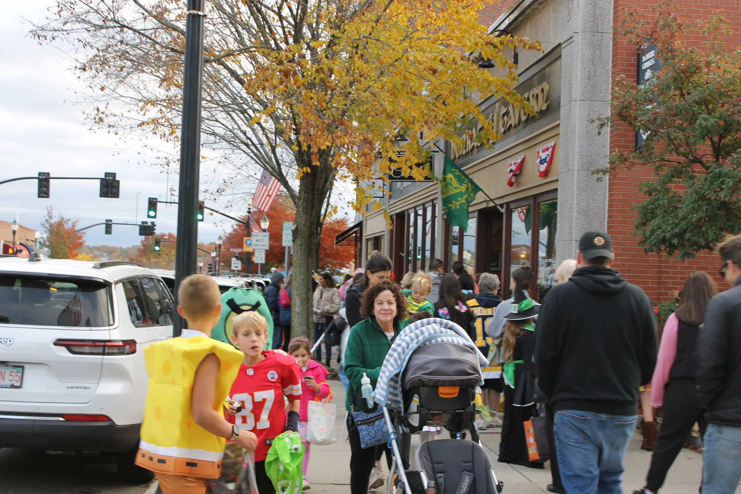 Kids along Main Street during downtown trick-or-treat.