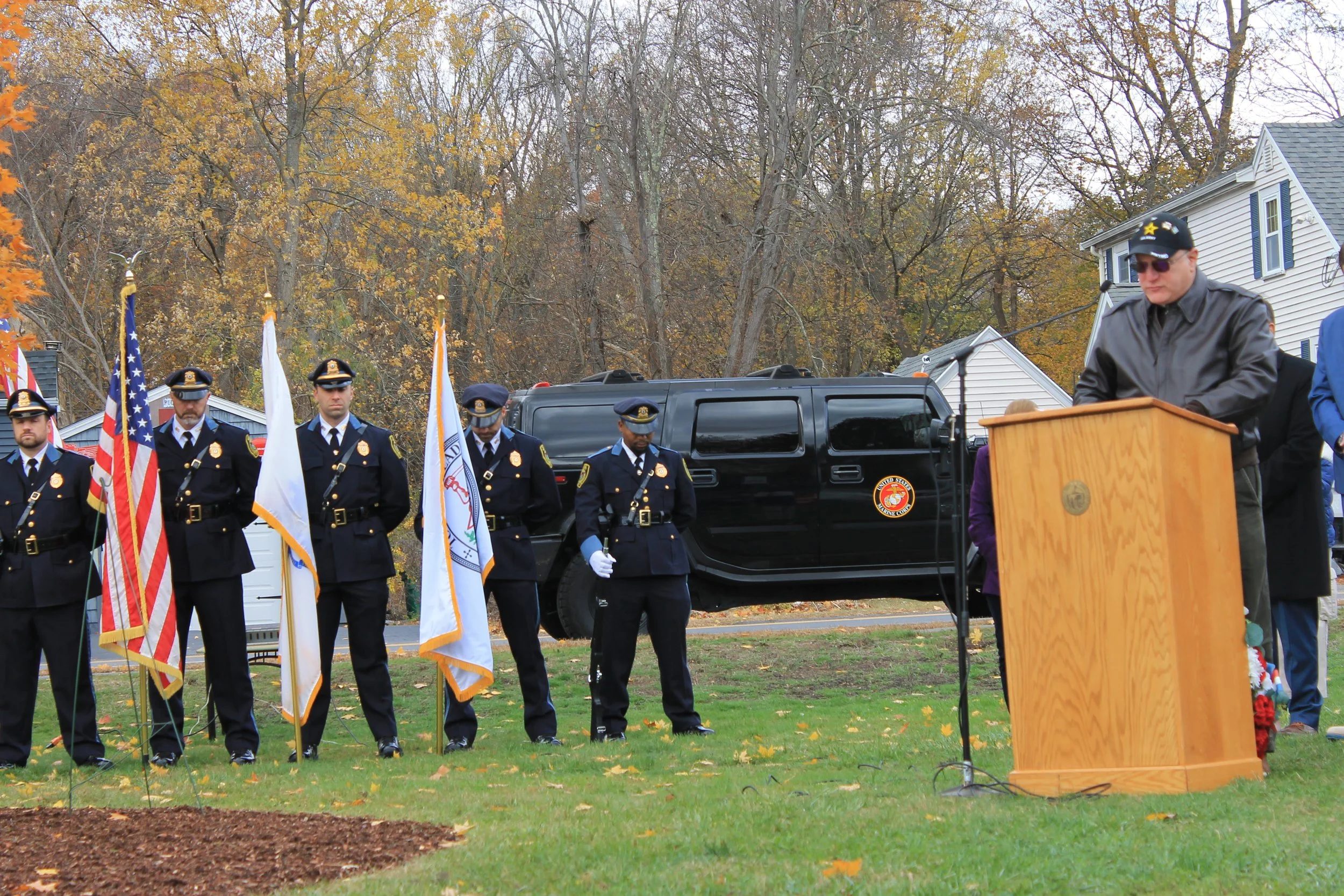 Chaplin Col-Ret Lawrence Bazer delivering the opening invocation at the Veterans Day Ceremony at Memorial Park.