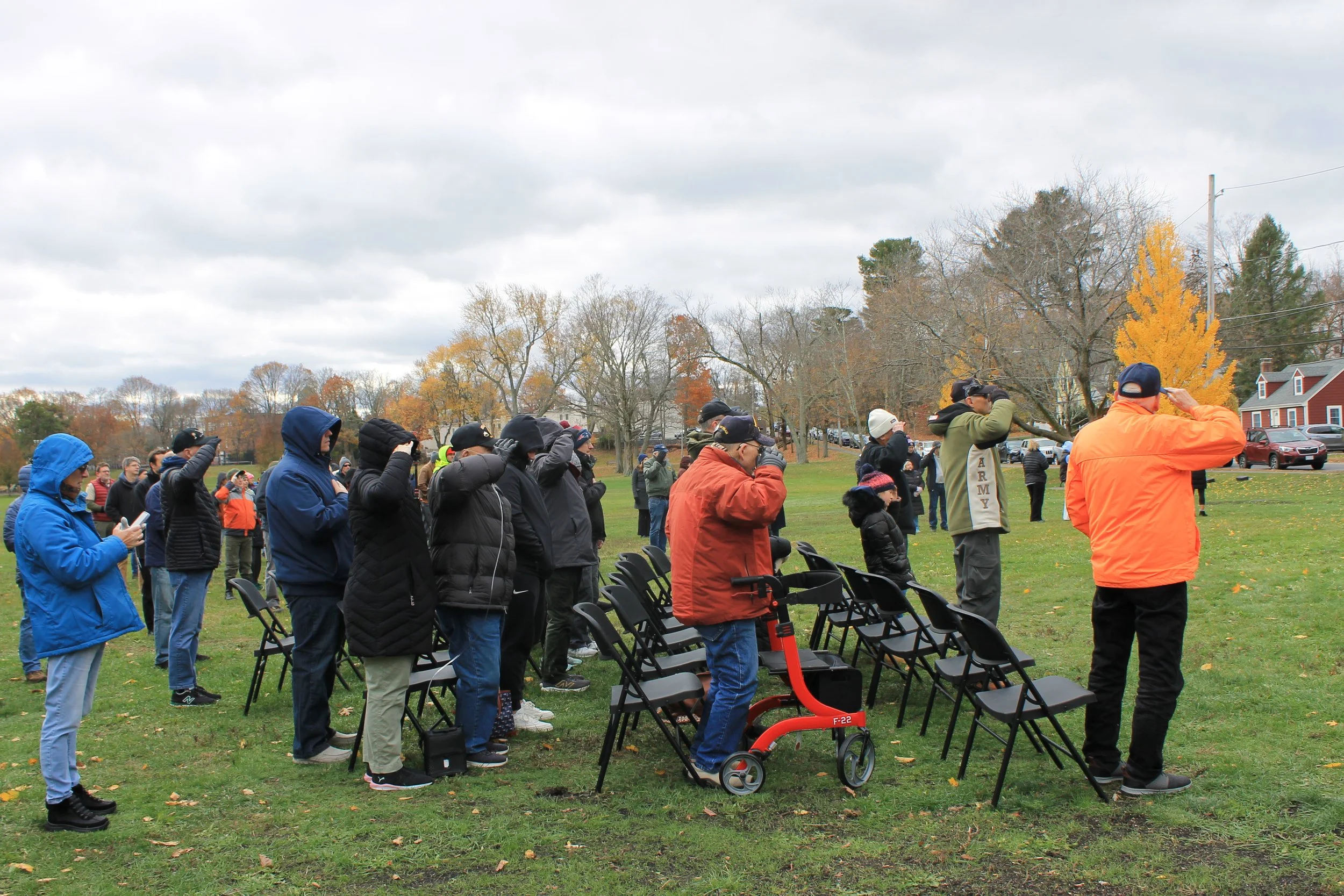 Veterans at attention during the rendition of Taps at the Veterans Day Ceremony at Memorial Park. 