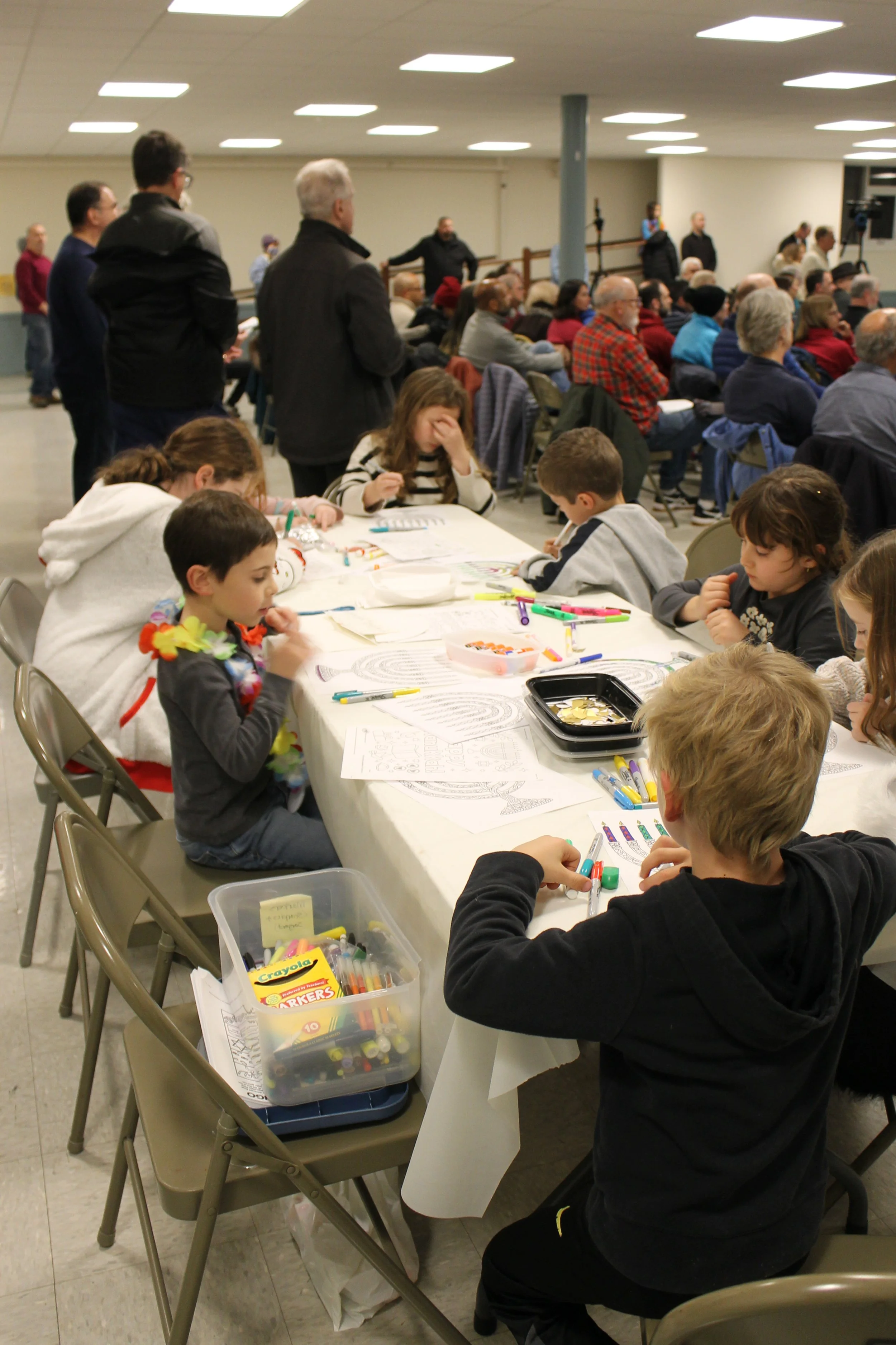 Children's activity table during the program at the Menorah Lighting.