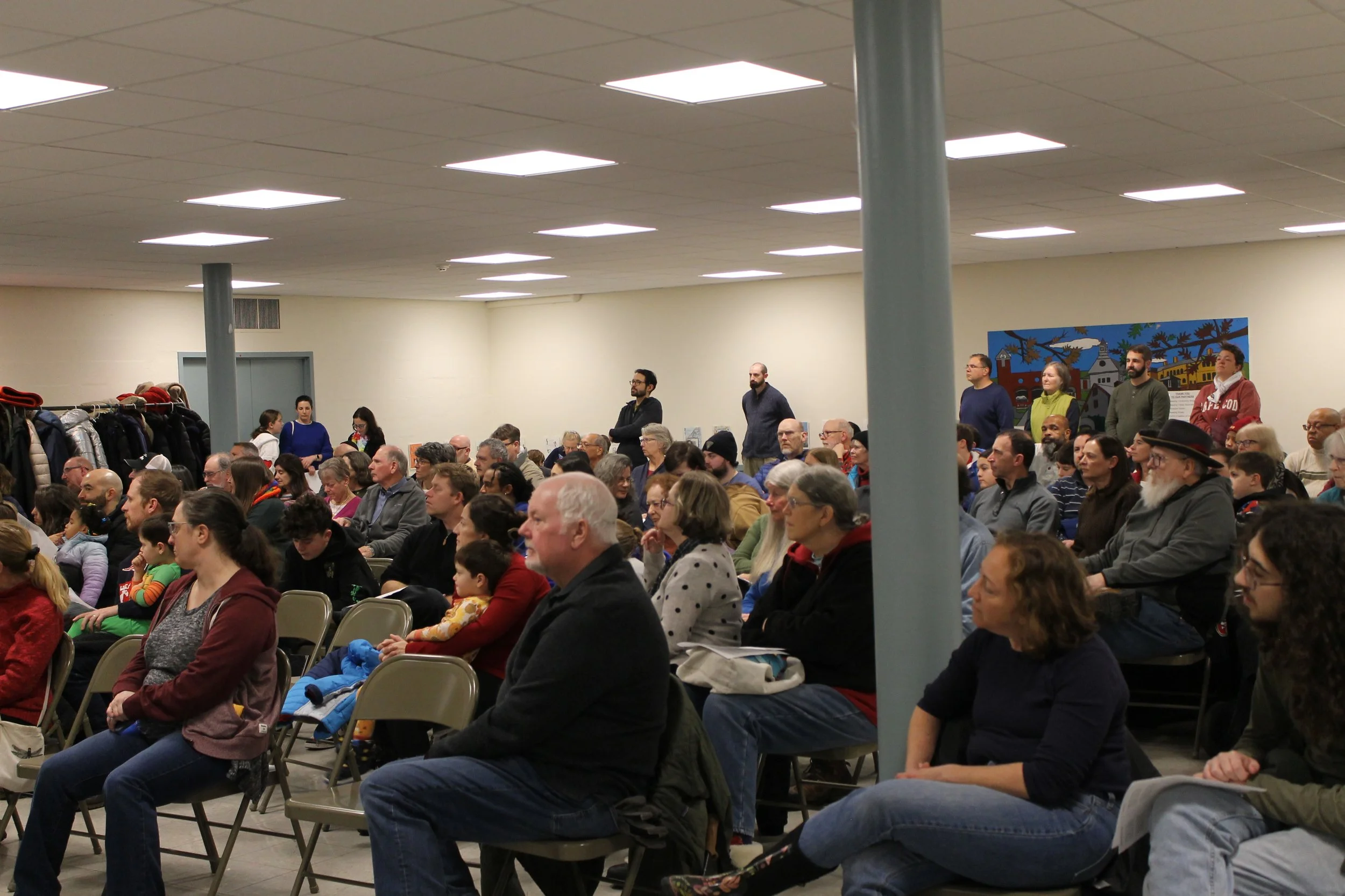Attendees observing the program at the Menorah Lighting.
