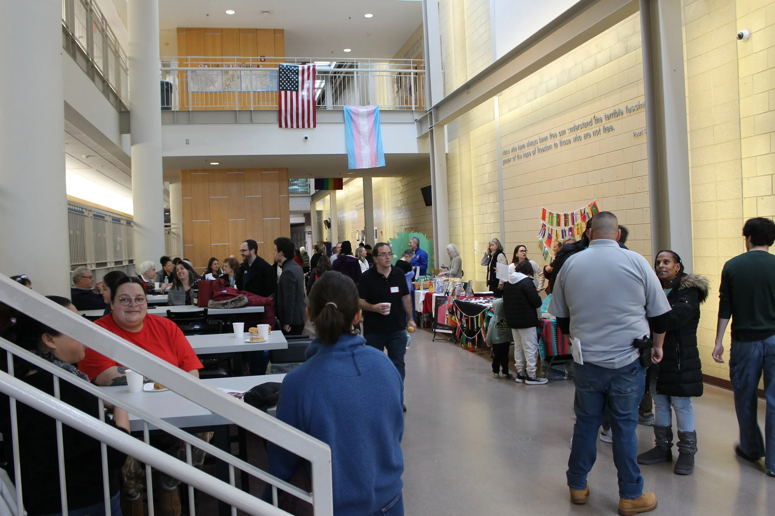 Attendees mingle and enjoy breakfast in the lobby of RMHS before the start of the Martin Luther King Jr. Day program.