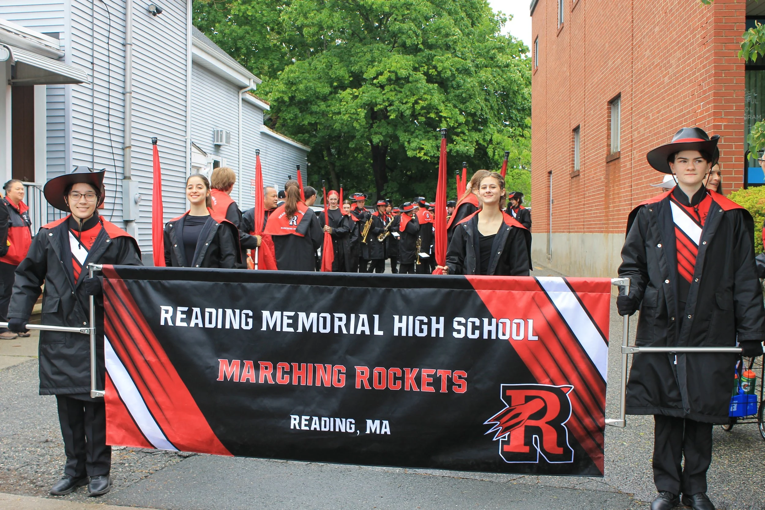 The Reading Memorial High School Marching Band and Color Gaurd prepare to lead the parade through downtown Reading.
