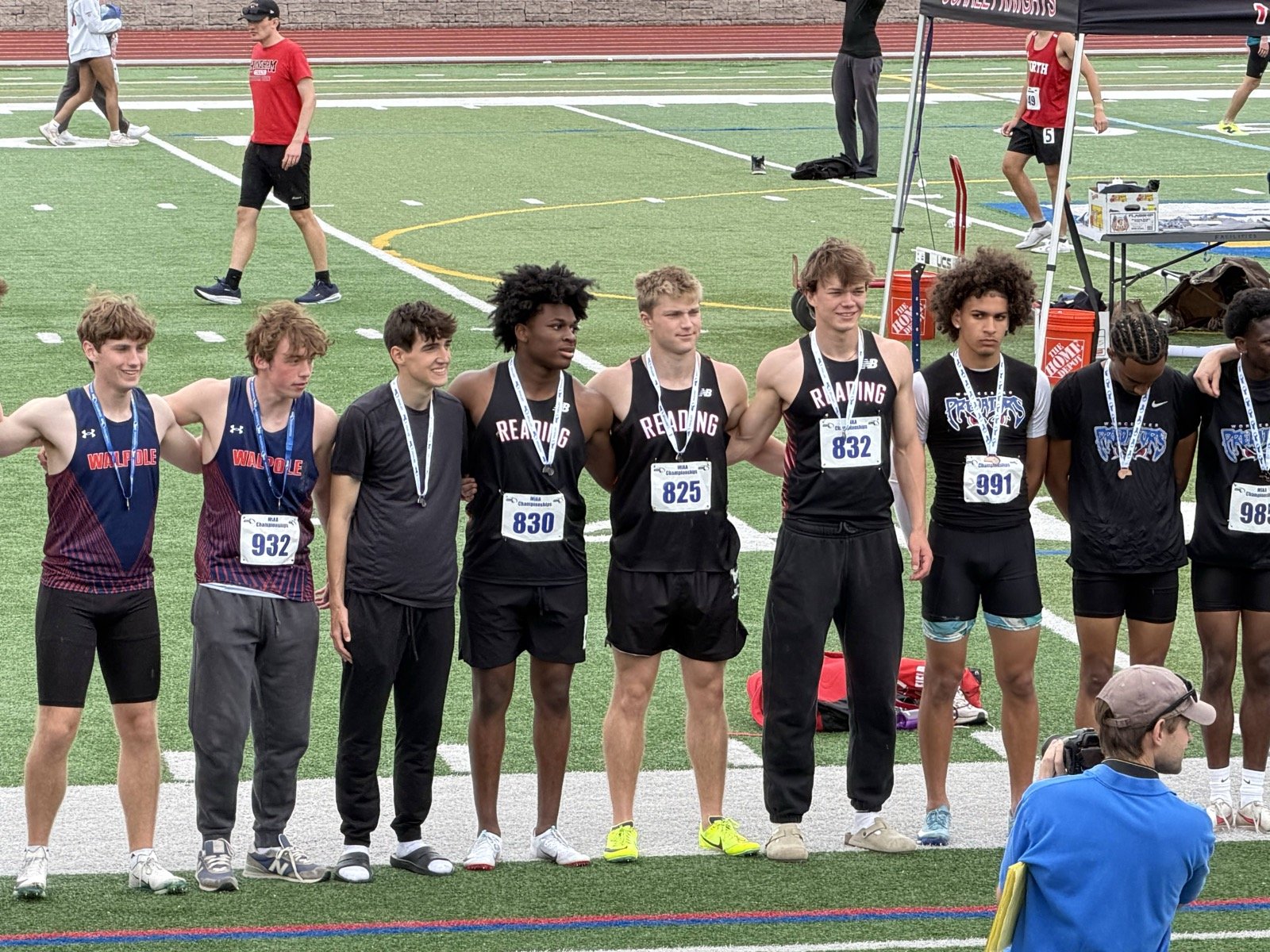 Reading’s second-place 4x100 team: Matthew Dougherty (third from left), Domenic Pate, Brady LaMontagne, and Zalen Puff.