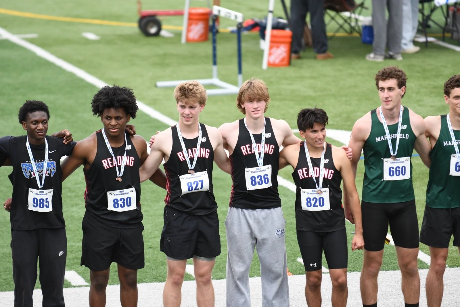 Reading’s third-place 4x400 team: Domenic Pate (second from left), Jack Millerick, Owen Sinclair, and Cam Gigler.