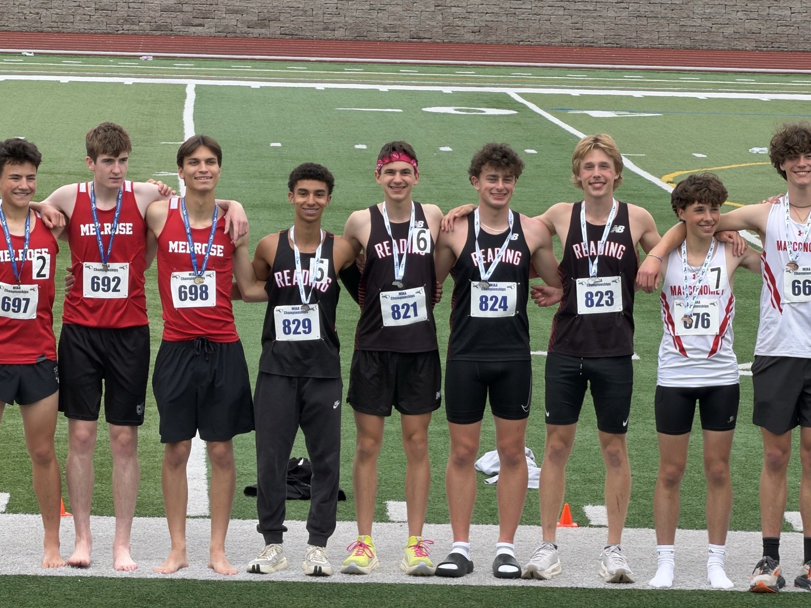 Reading’s second-place 4x800 relay team: Sebastian Orsini (fourth from left), Declan Grant, Max King, and Finn Johnson-Houlihan.