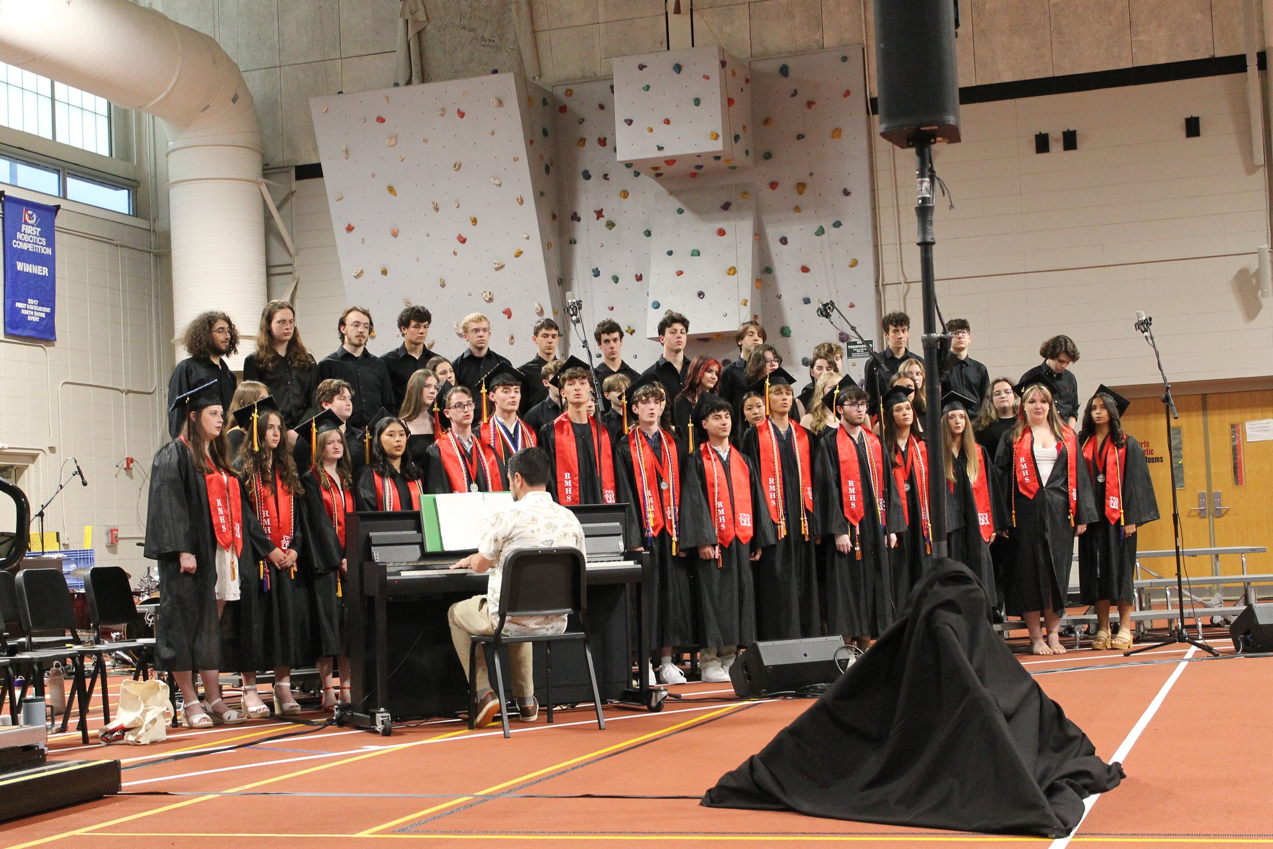 RMHS Choir performs under the direction of Andy Mullin during the graduation ceremony.