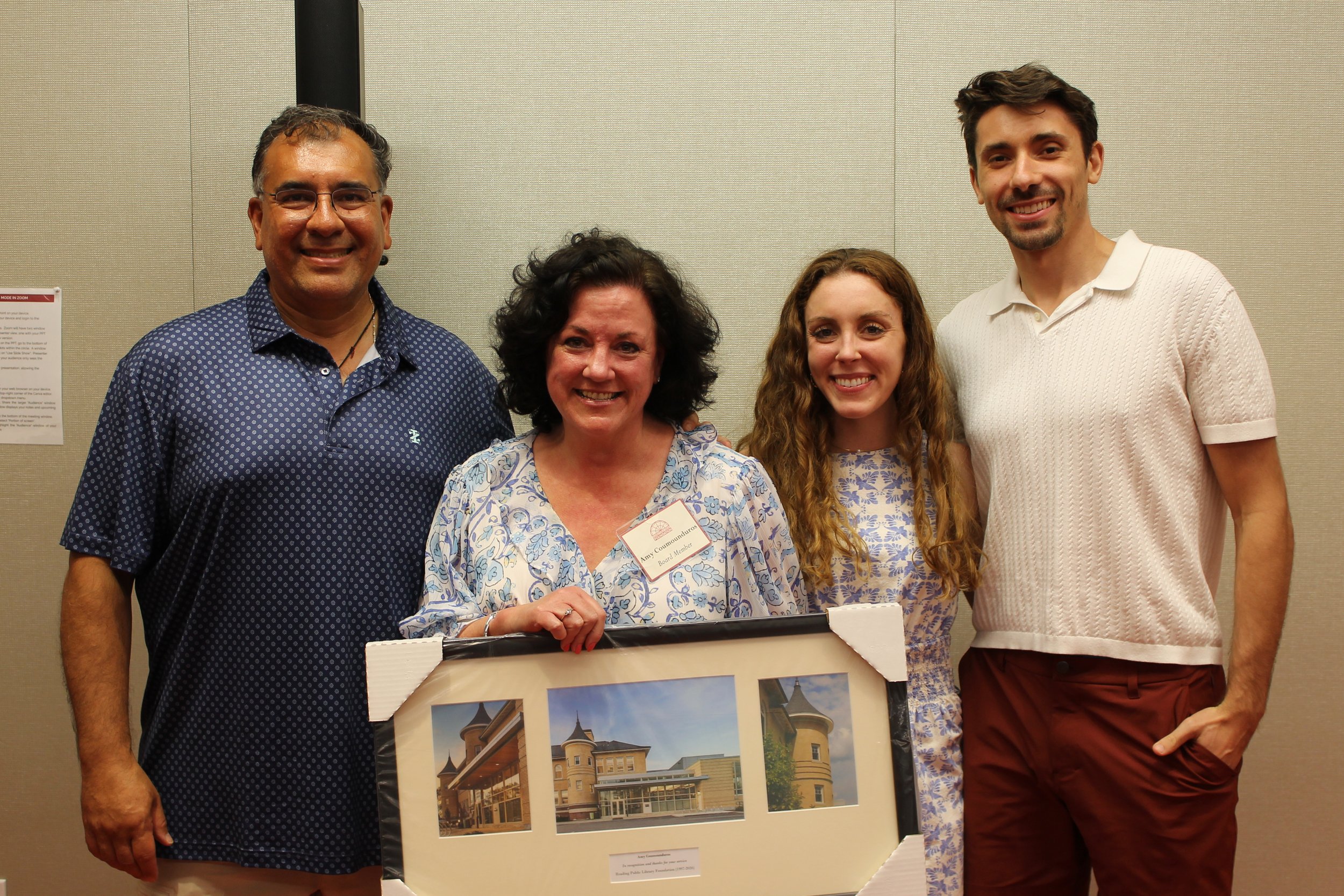 Amy Counmounduros, recognized for her years of service to the RPL Foundation, poses with family members.