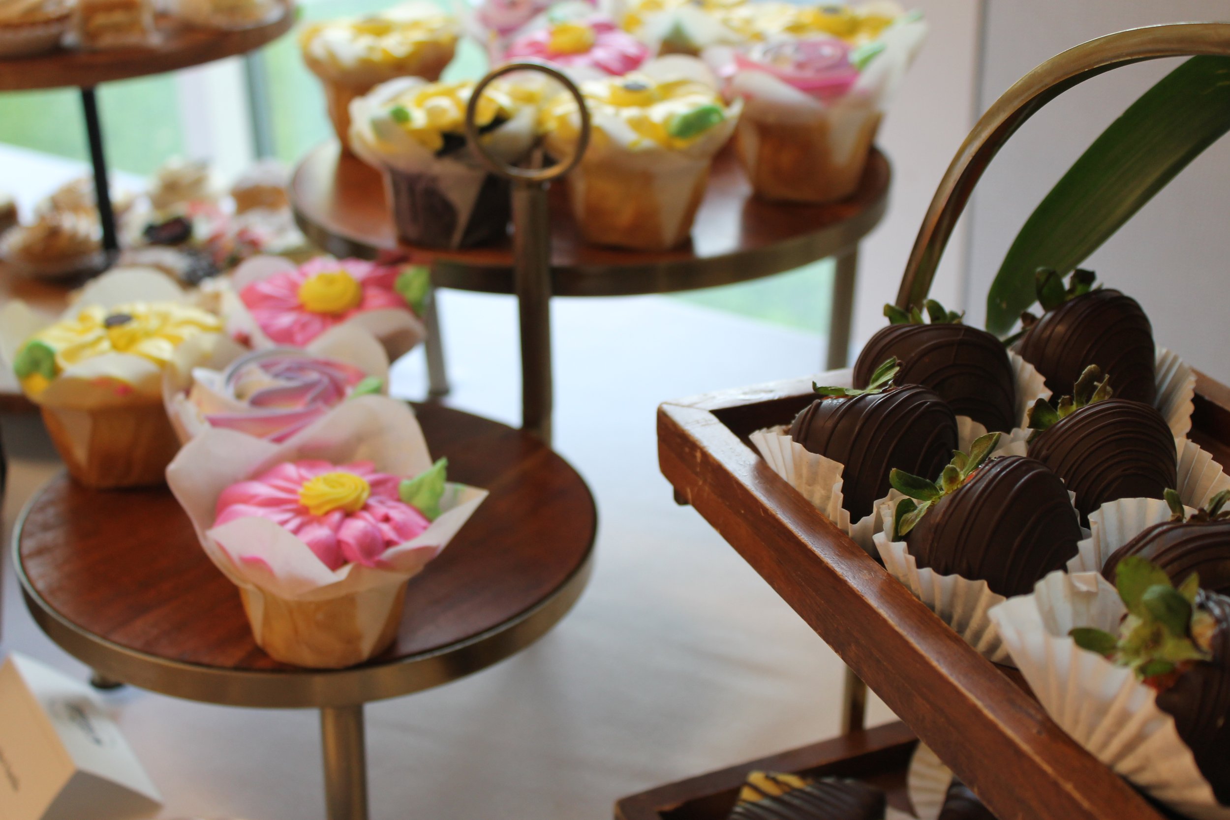Decorated cupcakes and chocolate-covered strawberries were among the refreshments served at the reception.