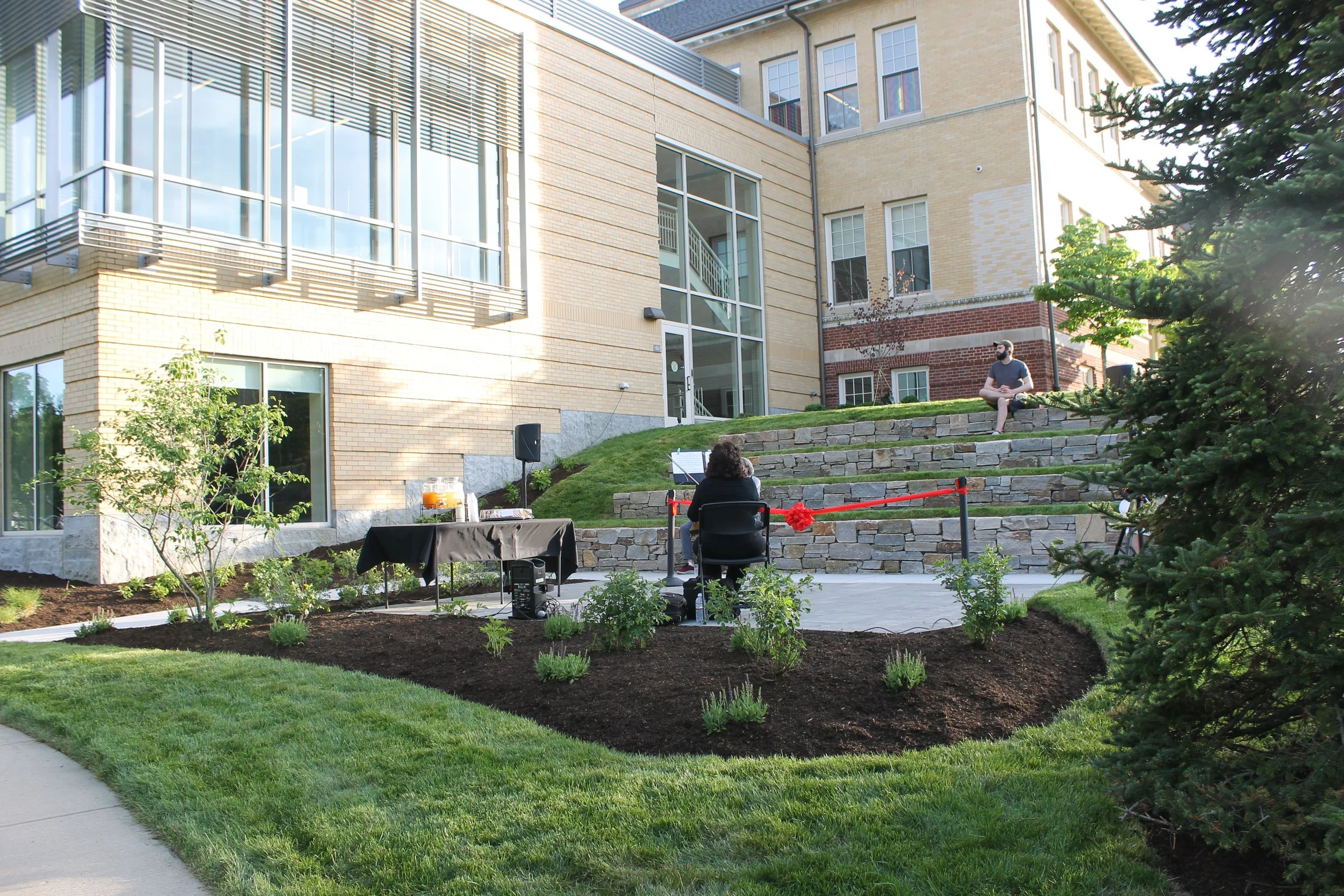 Violnisit Kenya performs on the newly completed Library Terrace ahead of the ribbon cutting ceremony.