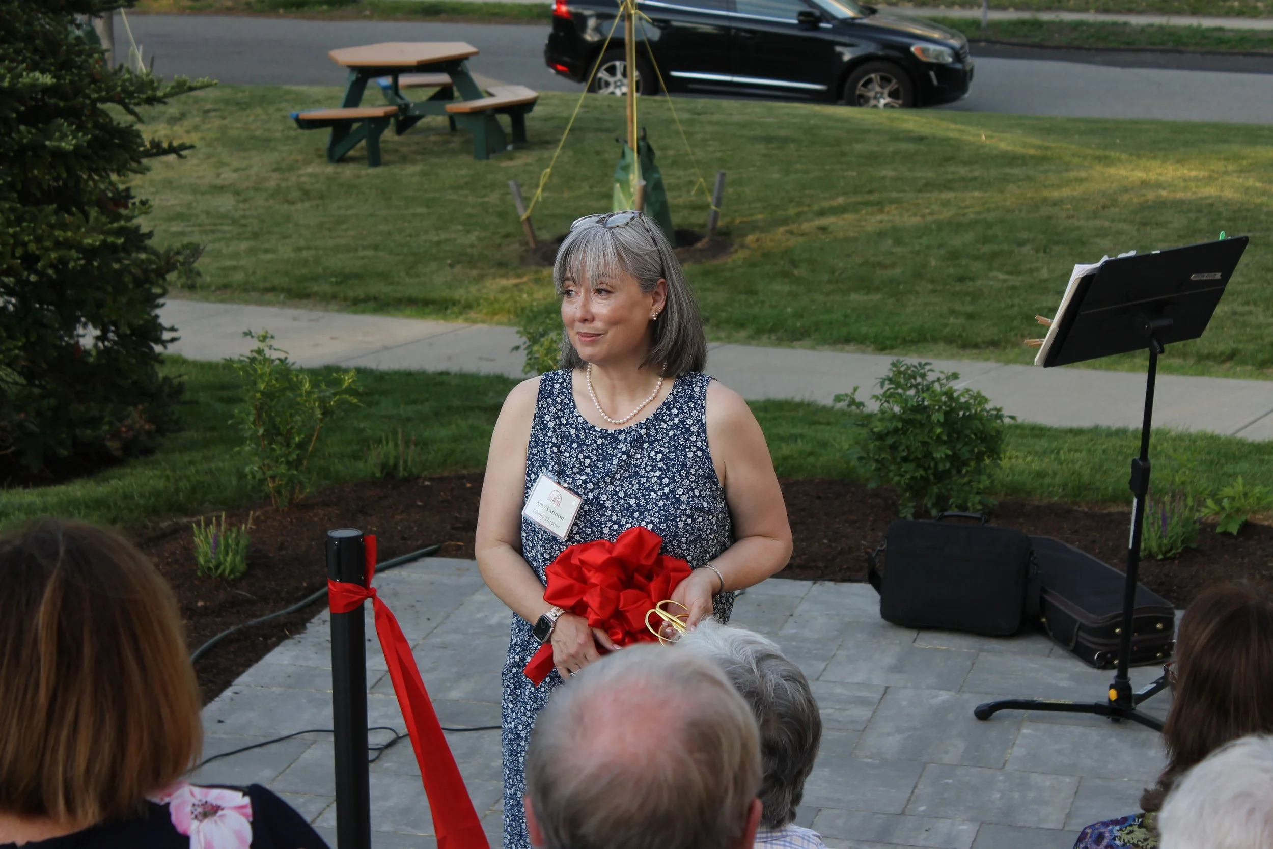 Library Director Amy Lannon delivers closing remarks on the new Library Terrace following the ribbon cutting ceremony.