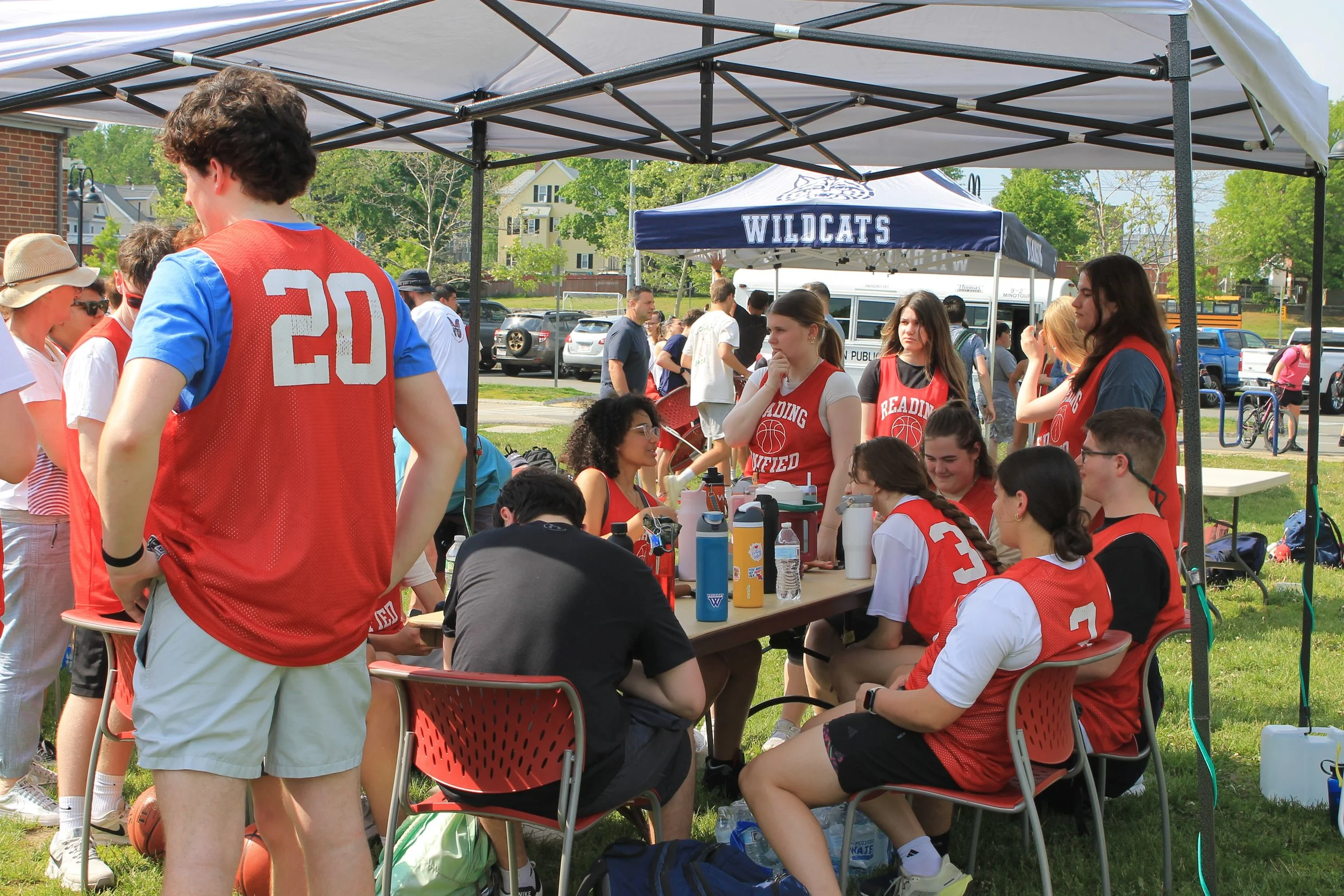 Reading Unified players gather under a tent for water and shade ahead of their games at the Jamboree.