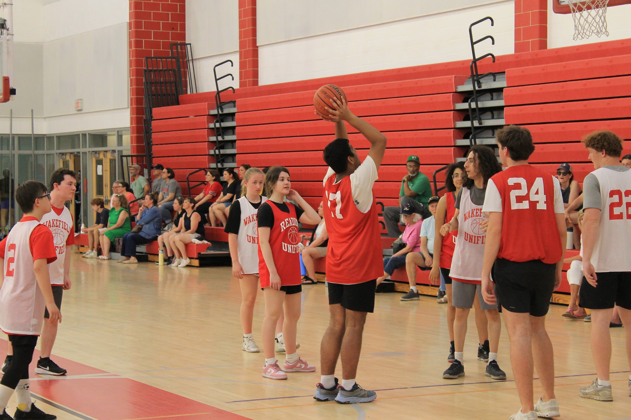 Reading and Wakefield Unified players face off inside the Galvin Middle School gym.