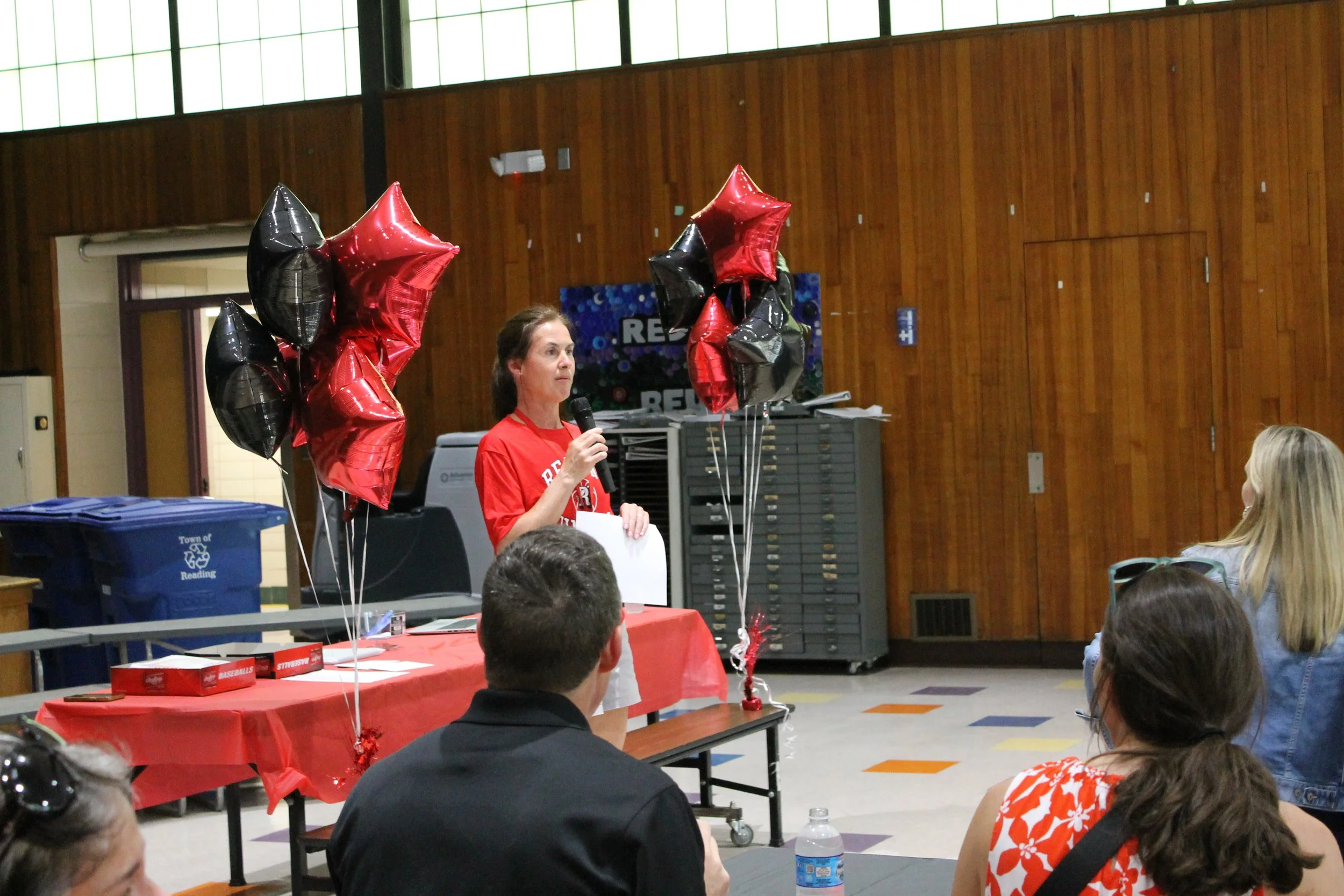 Head coach Tara Herlihy addresses the room at the Unified Sports Banquet.