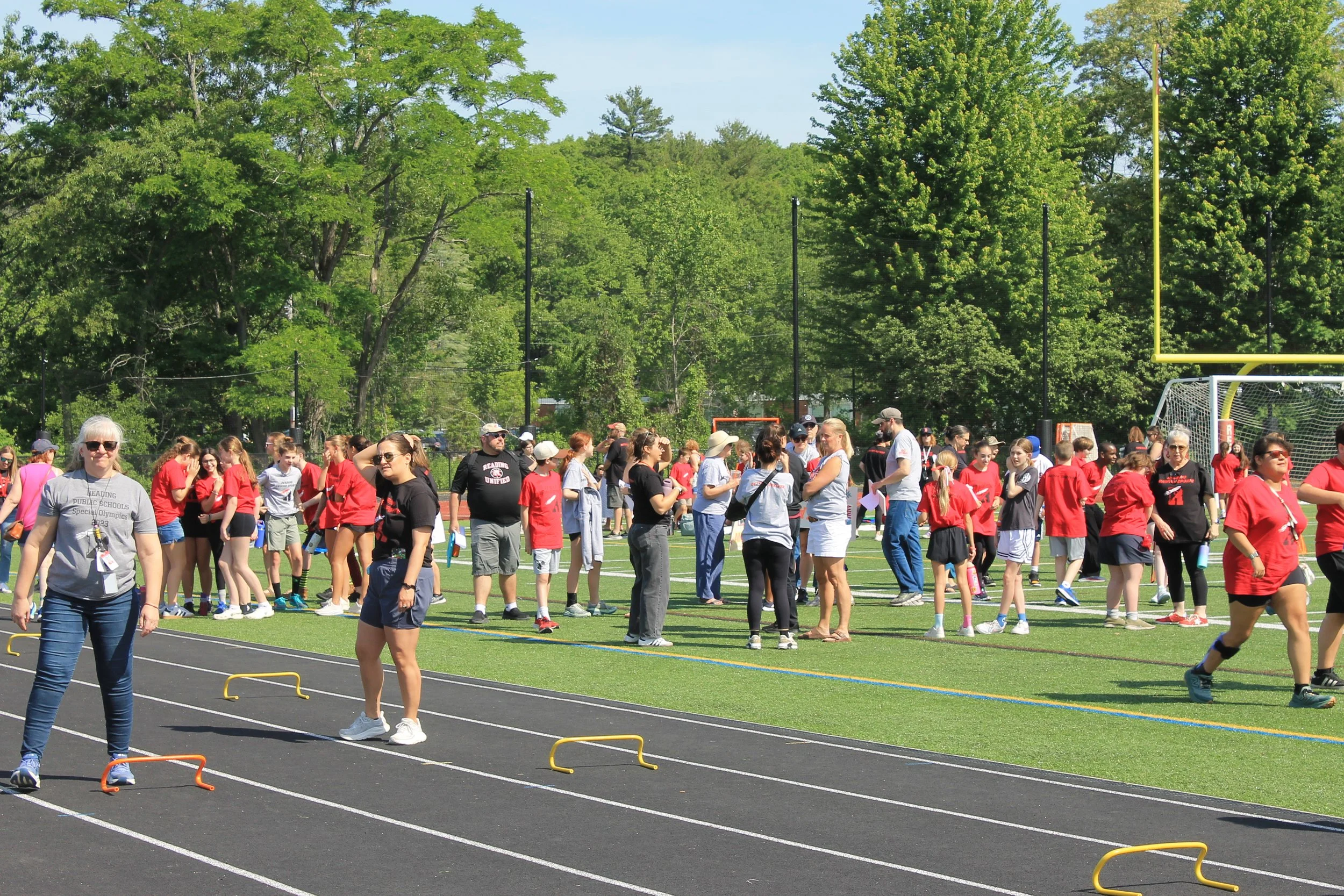 Athletes, staff, and families all gathered on the turf and track as part of Unified Sports Day on June 5.