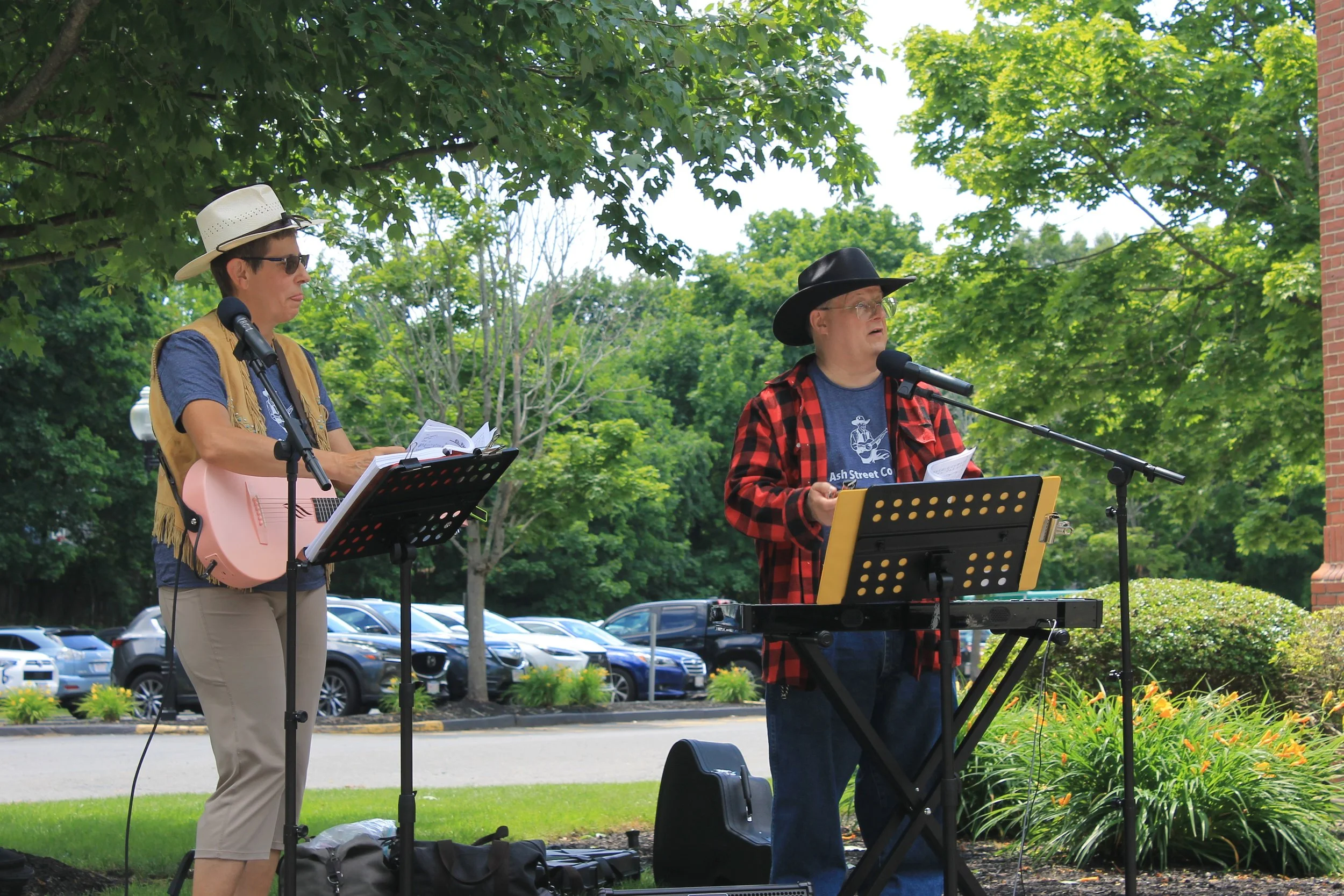 The Philip Corcoran duo brings western fair to their Porchfest set.