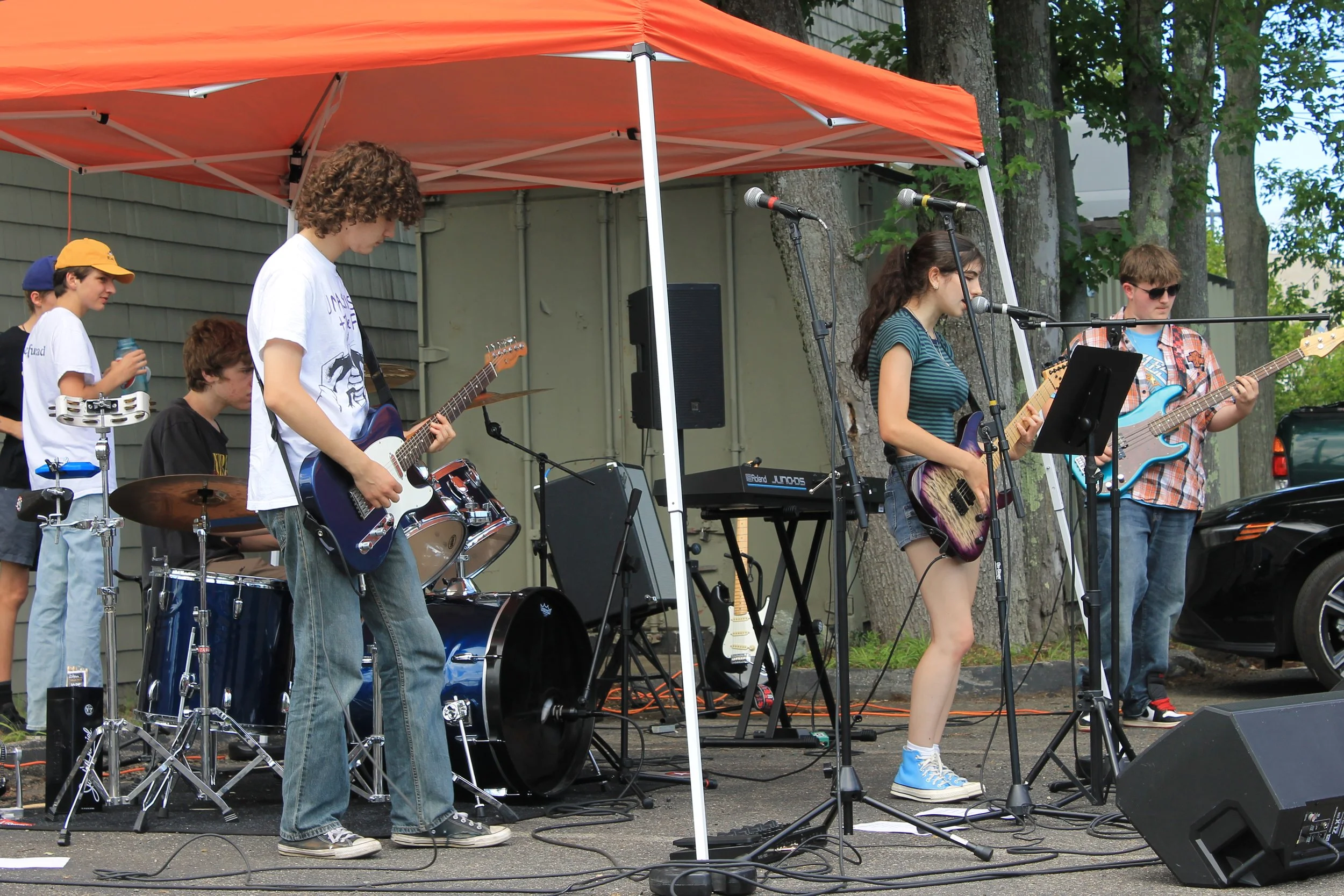 Young musicians from Onslaught take the stage for Porchfest.