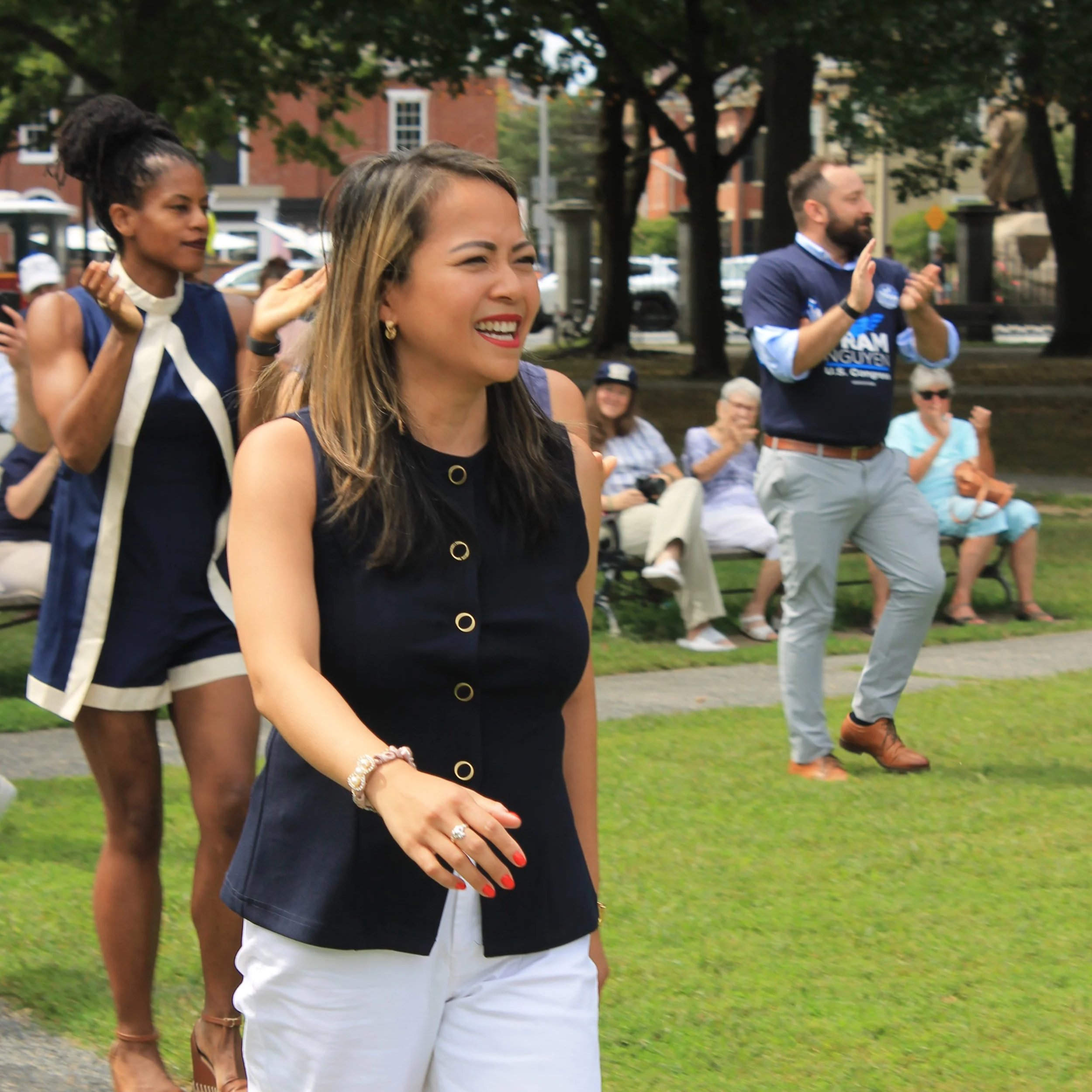 Tram Nguyen greets supporters at her rally on the Salem Common.