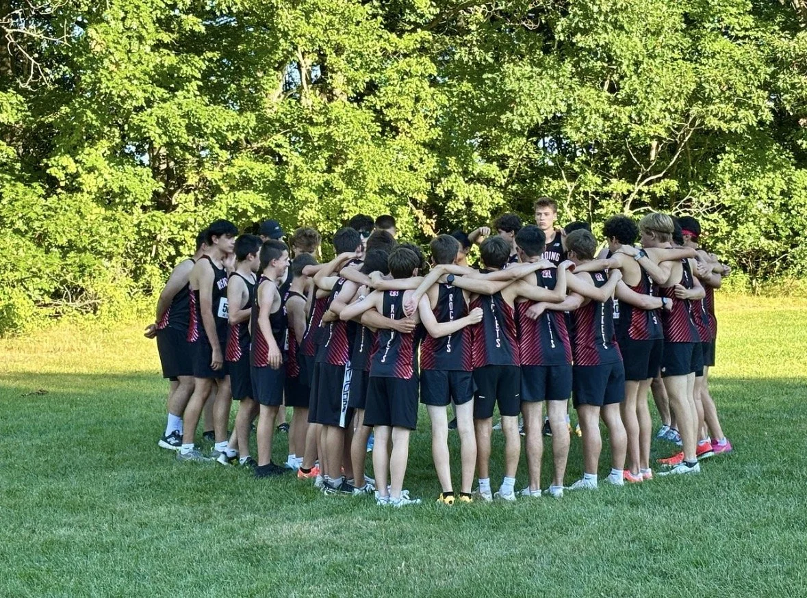 The Reading boys’ cross country team gets ready for their first meet.