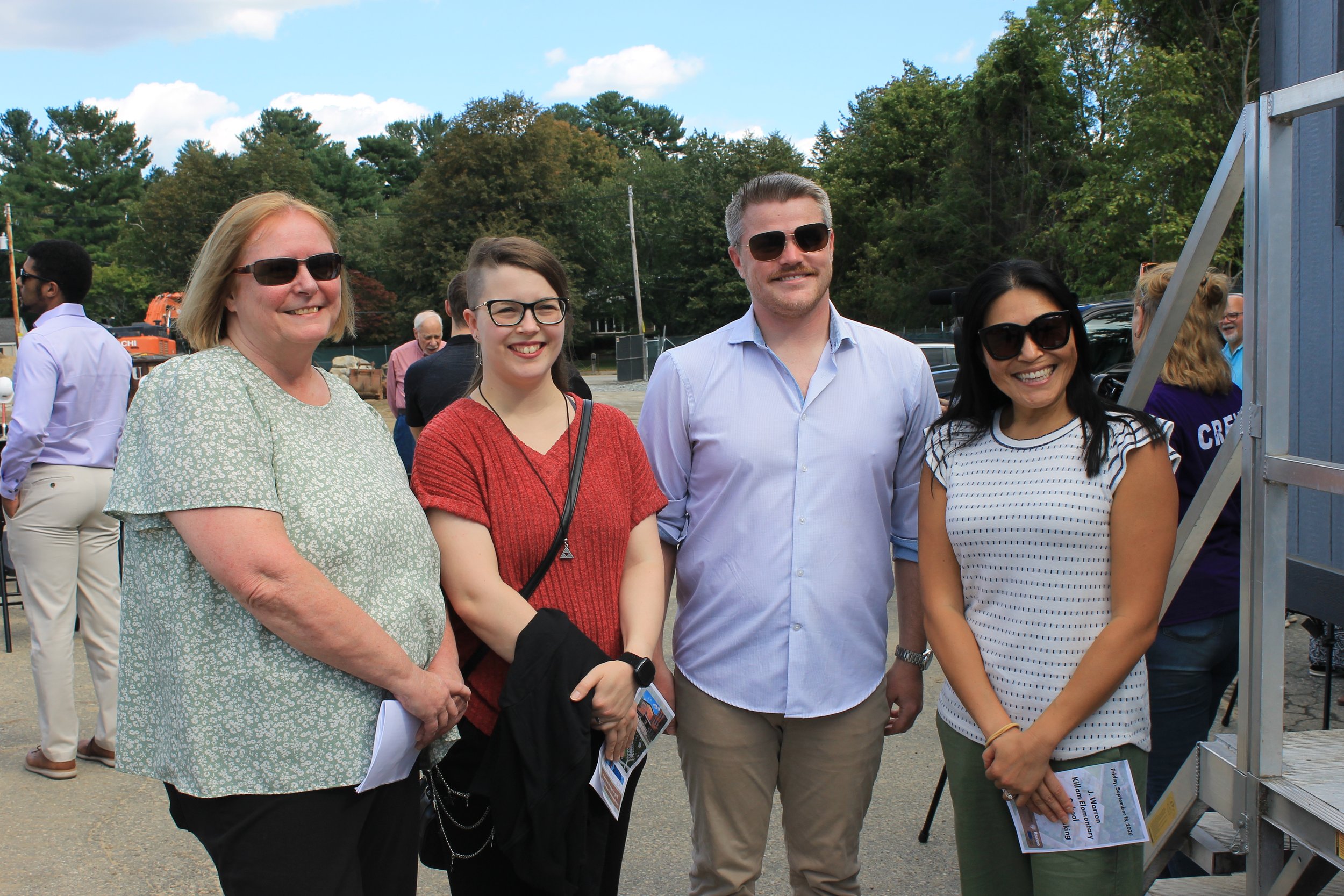 Former project staff pose together for a photo at the Killam groundbreaking event.