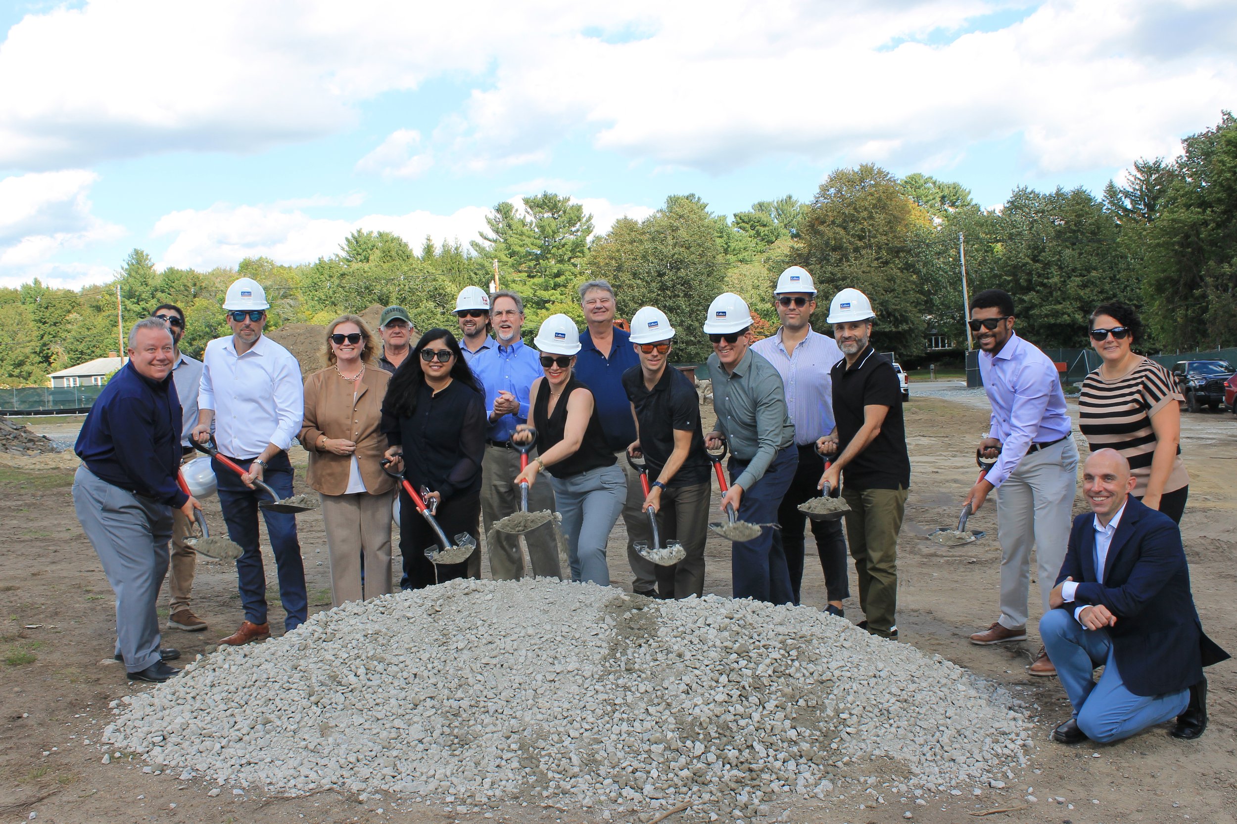 Officials, staff, and project partners gather for a group photo at the Killam School groundbreaking.