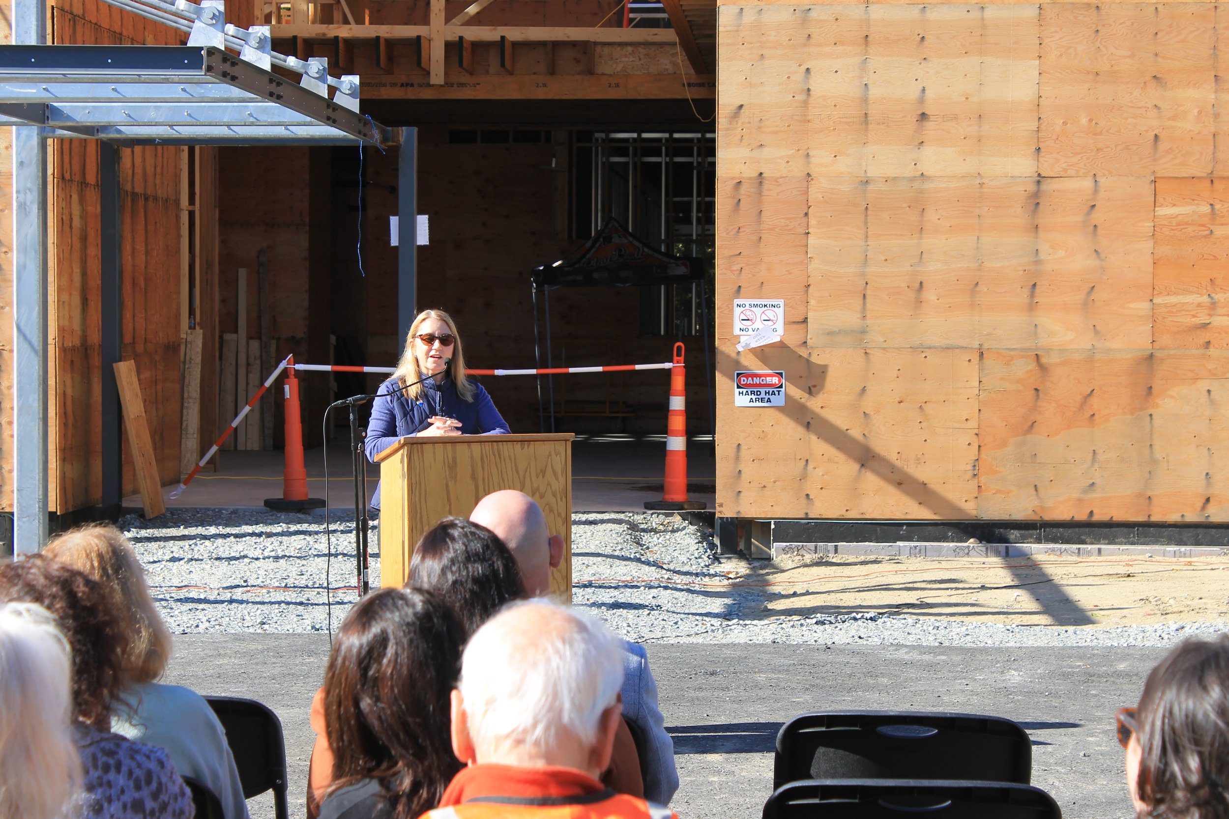Select Board member Karen Herrick shares remarks during the ReCAL topping off ceremony.