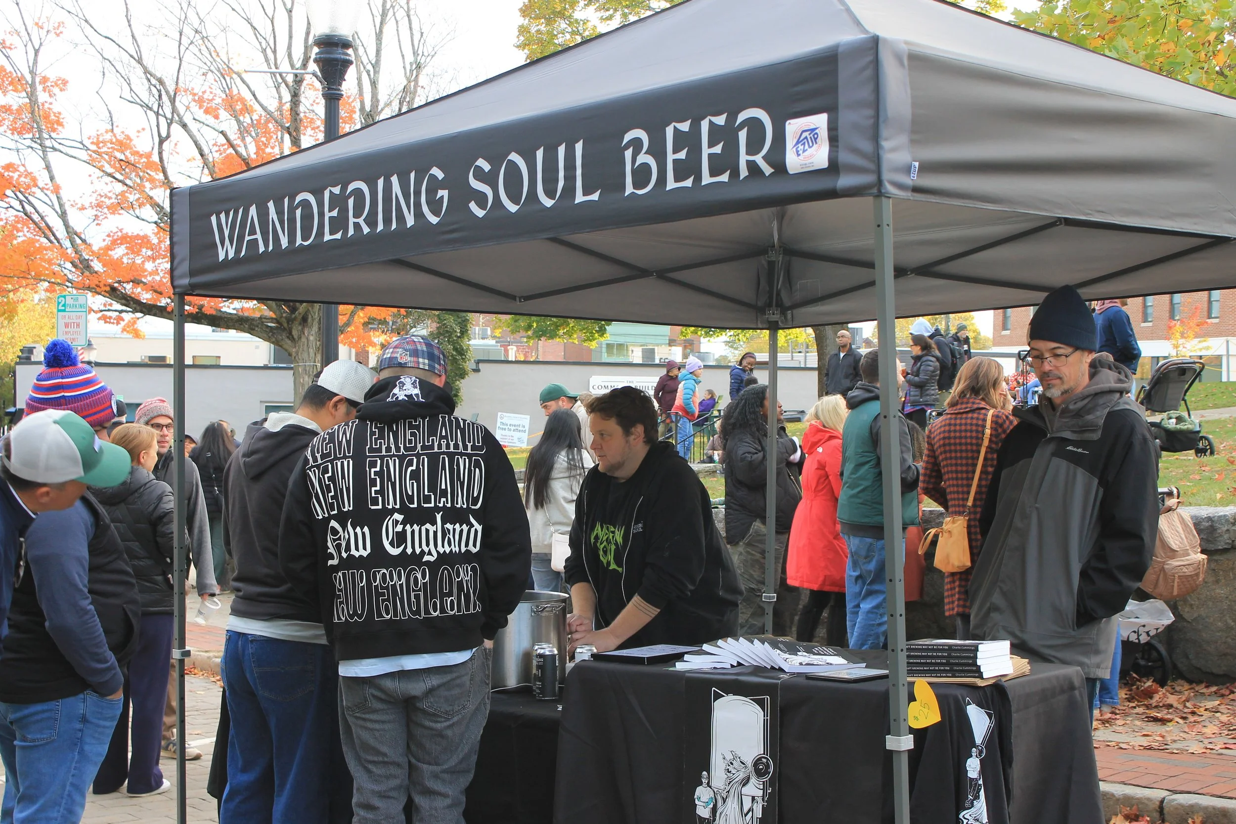 Attendees gather at the Wandering Soul Beer tent.