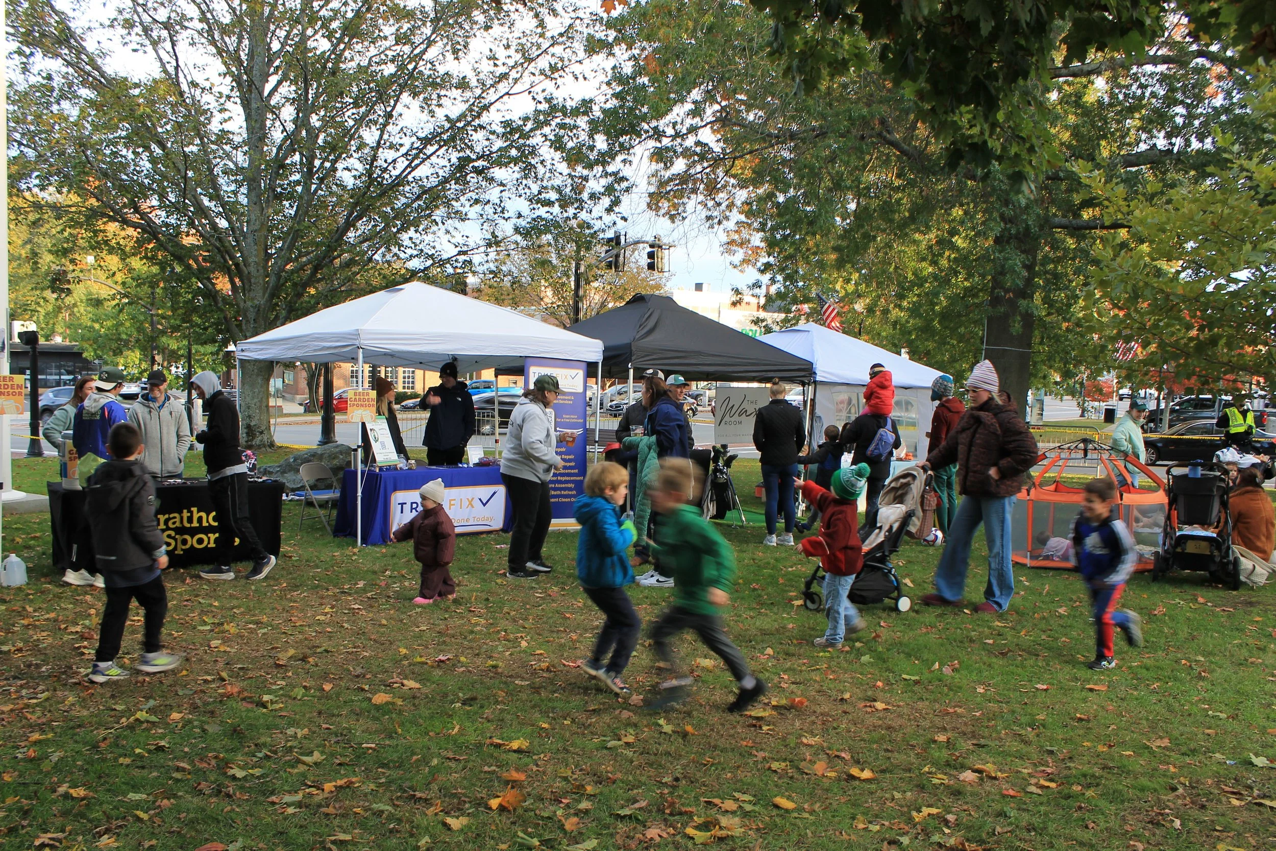 Children run across the lawn hear vendor tables.