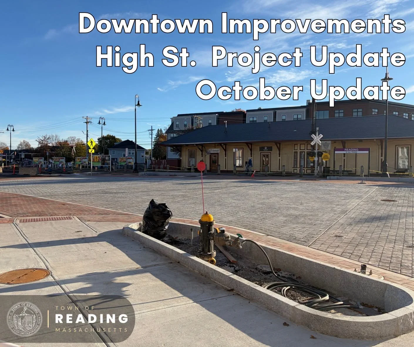 Graphic reading “Downtown Improvements High St. Project Update October Update” over a photo of a fire hydrant in a granite-edged island, with the Reading train station behind.