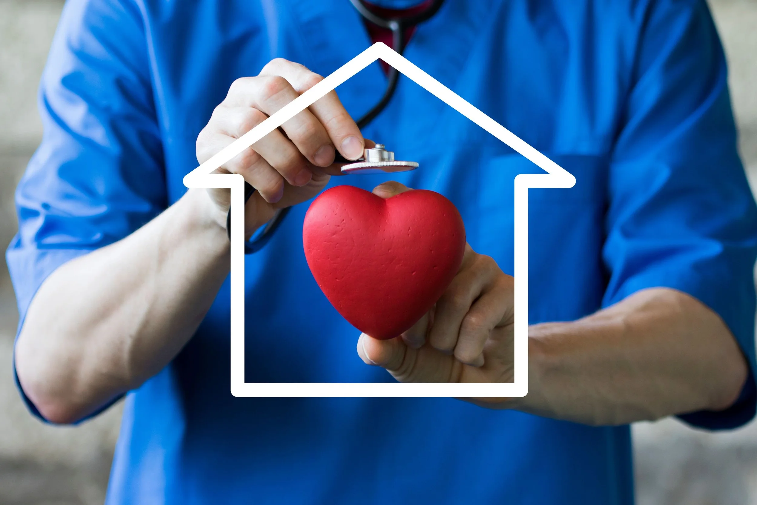 Person in a blue hospital gown holding a red heart-shaped object and a stethoscope, with a white outline of a house surrounding the objects.