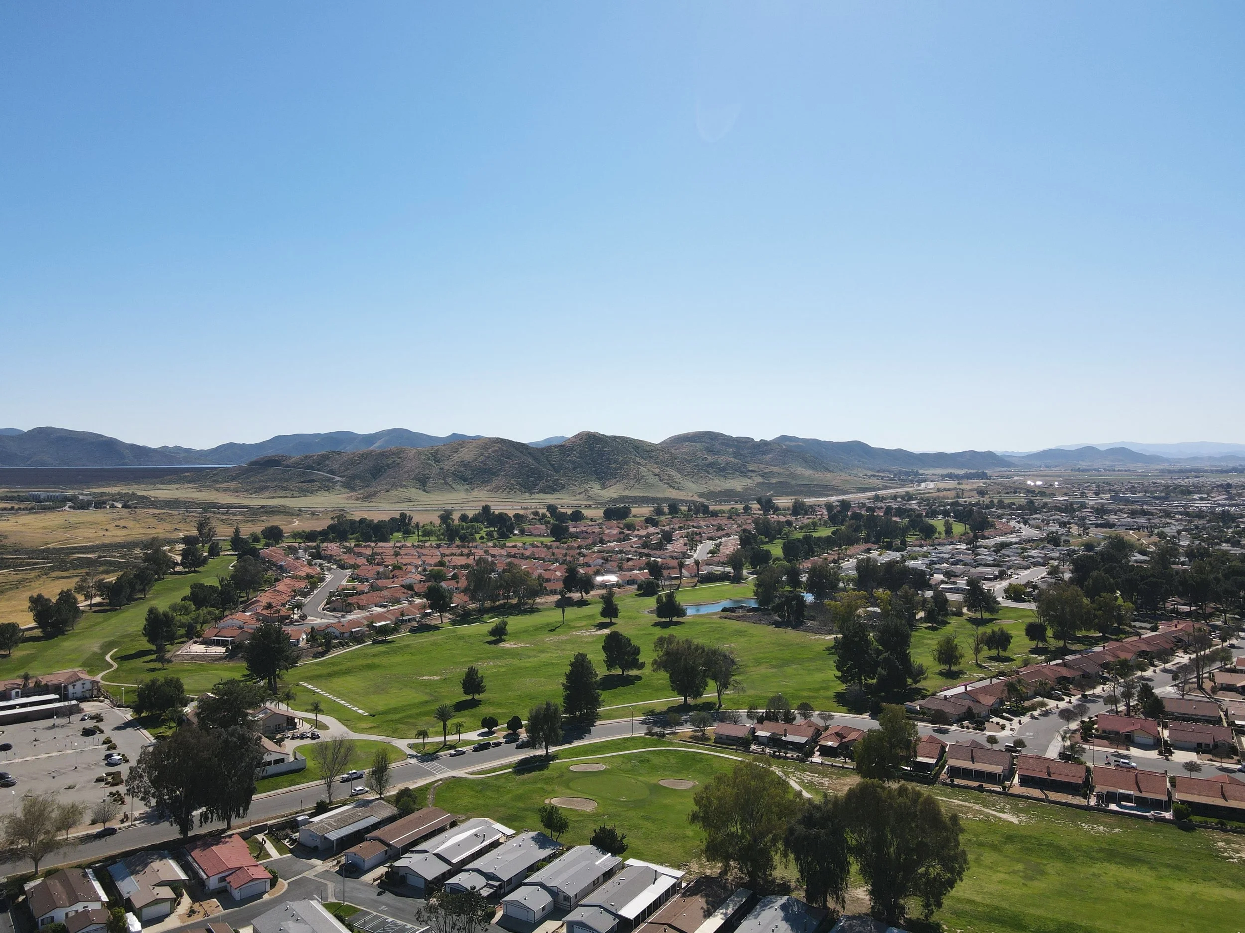 Seven Hills Golf Club driving range and 18th hole from aerial view