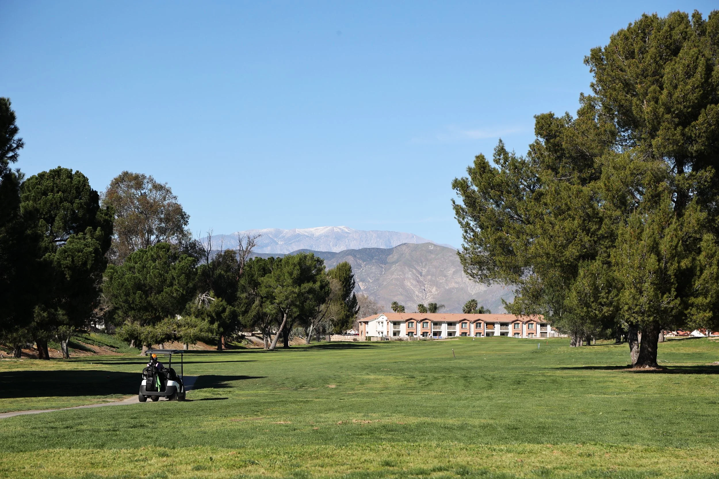 Seven Hills Golf Club 18th hole fairway with mountain views