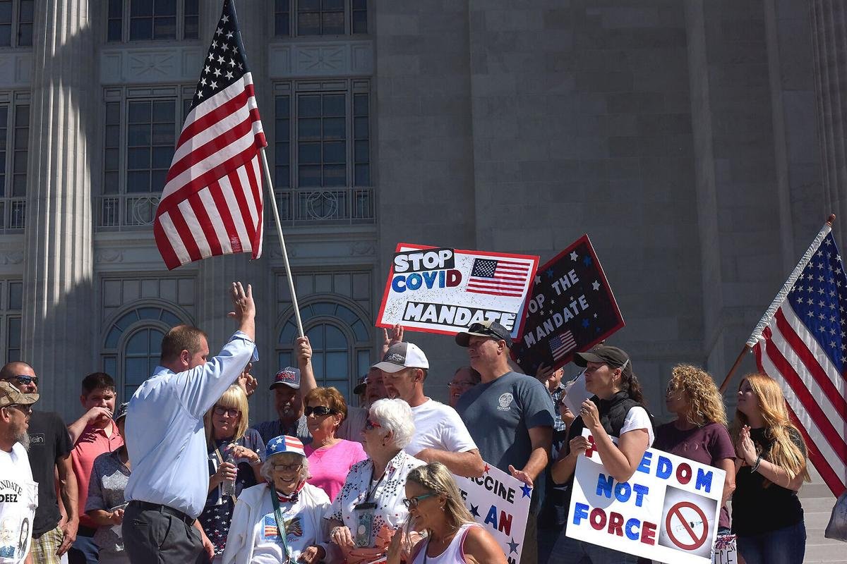Missouri Attorney General Eric Schmitt greets protesters at an anti-mask, anti-vaccine protest Sept. 15 at the state Capitol. On Tuesday, Schmitt ordered school districts and public health agencies to bring an immediate end to mask and quarantine pol