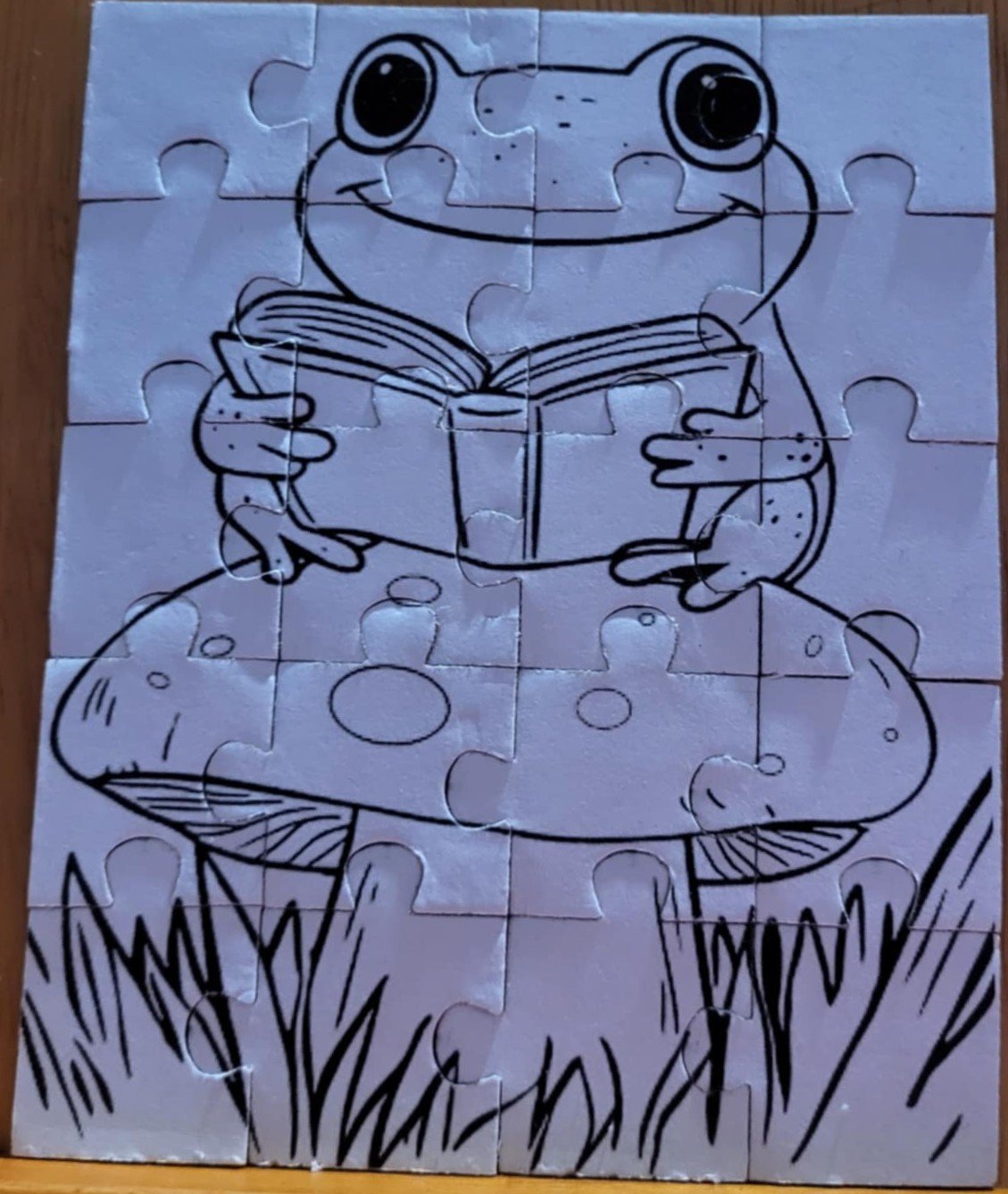 u color frog reading on mushroom.jpg