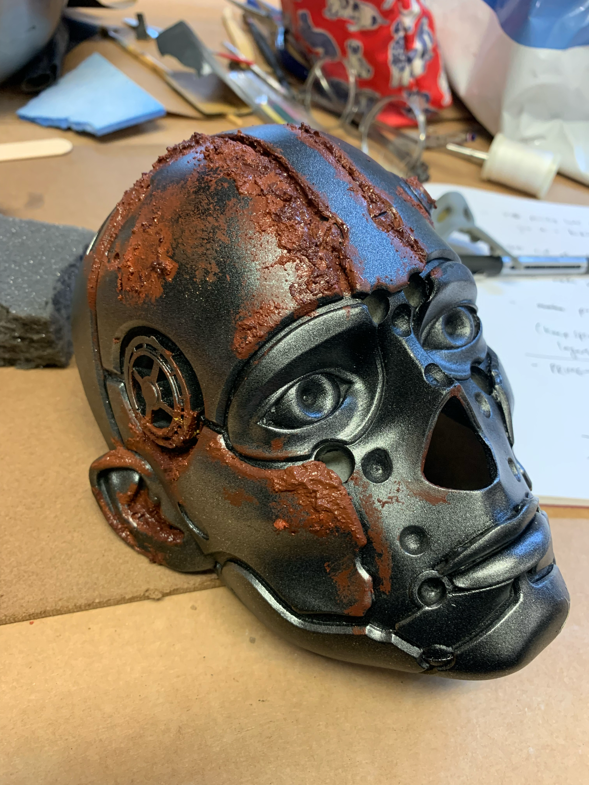 Firstly rust, adding texture with sand too