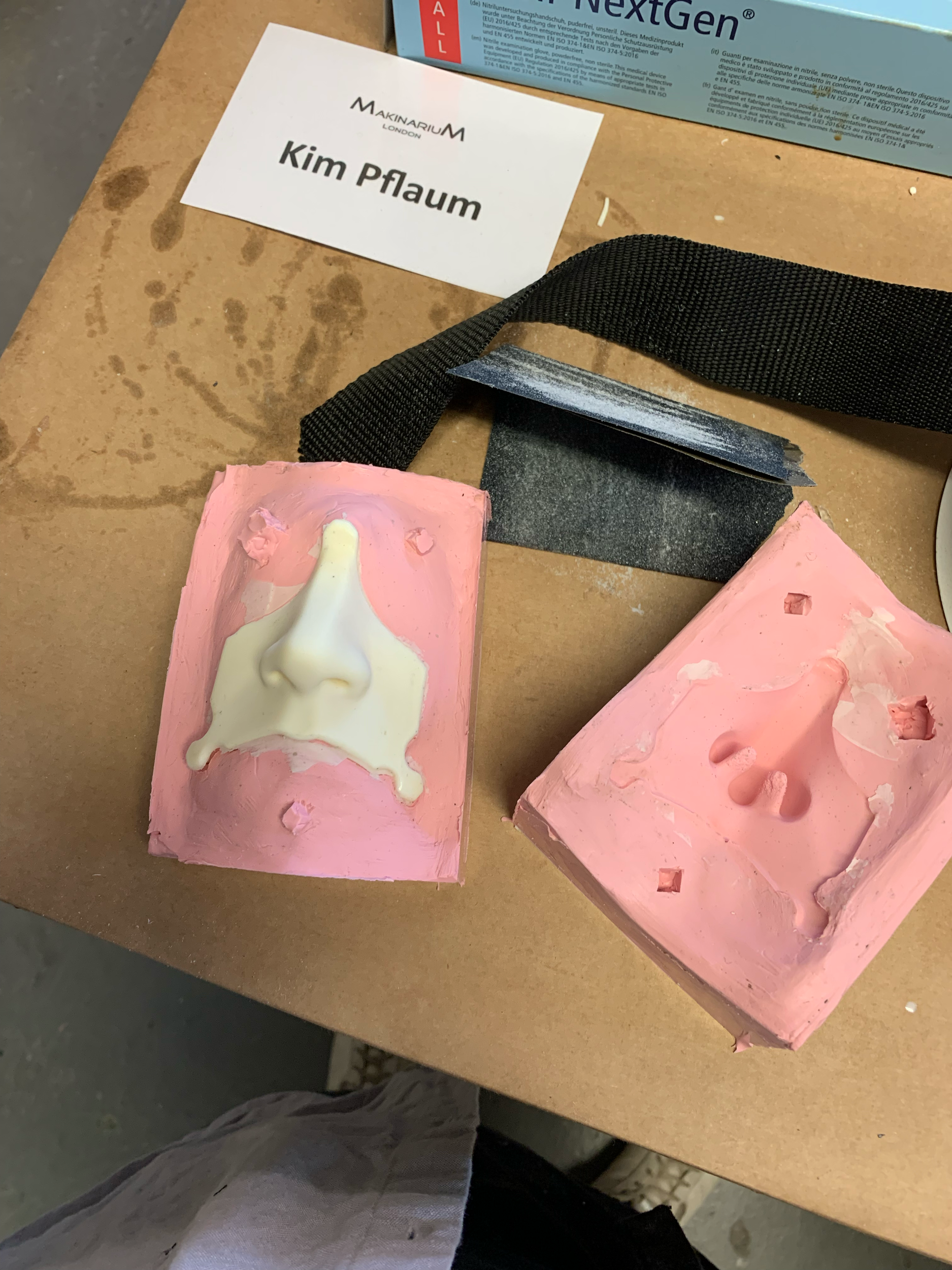 Releasing the cast nose piece, then trimming and lightly sanding 