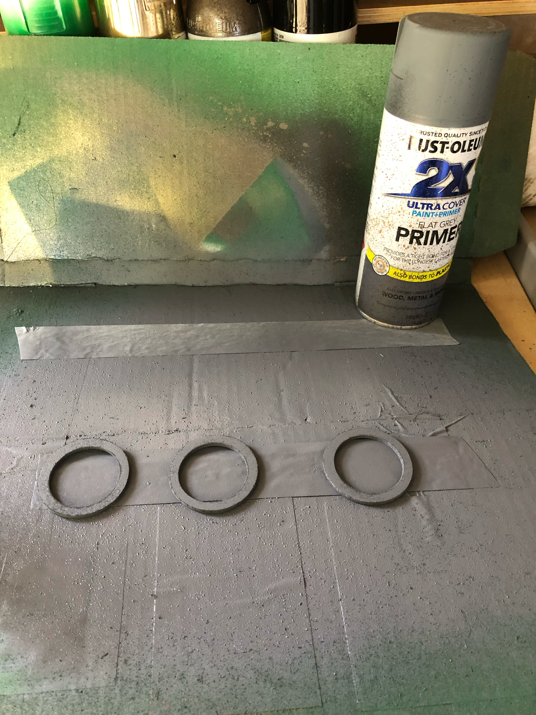 I then sanded the edges, prepped and primed, then painted with the same green spray paint as the door
