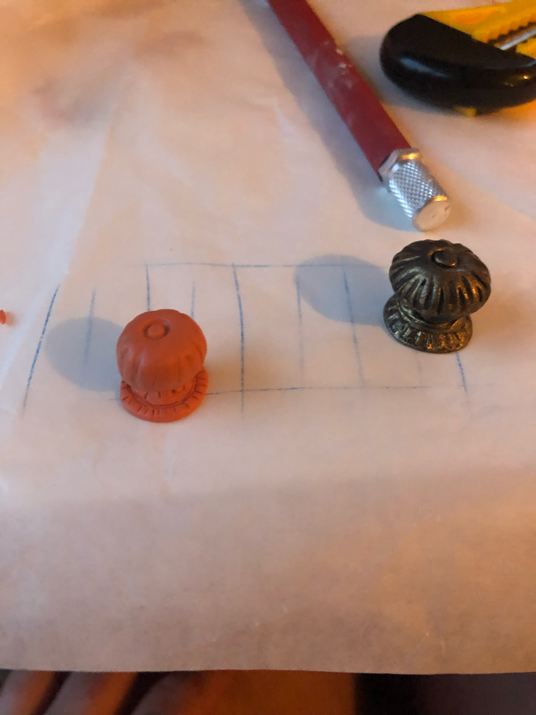 I decided to make a smaller doorknob that looked optically more to scale