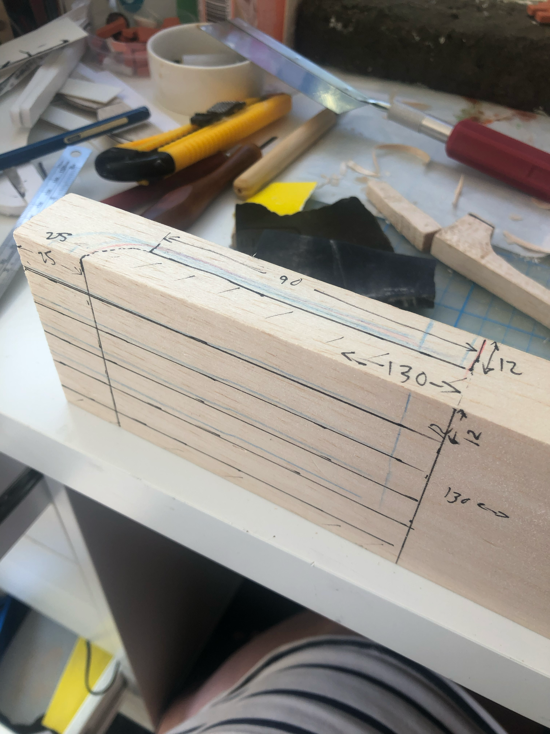 I cut and carved the posts from balsa