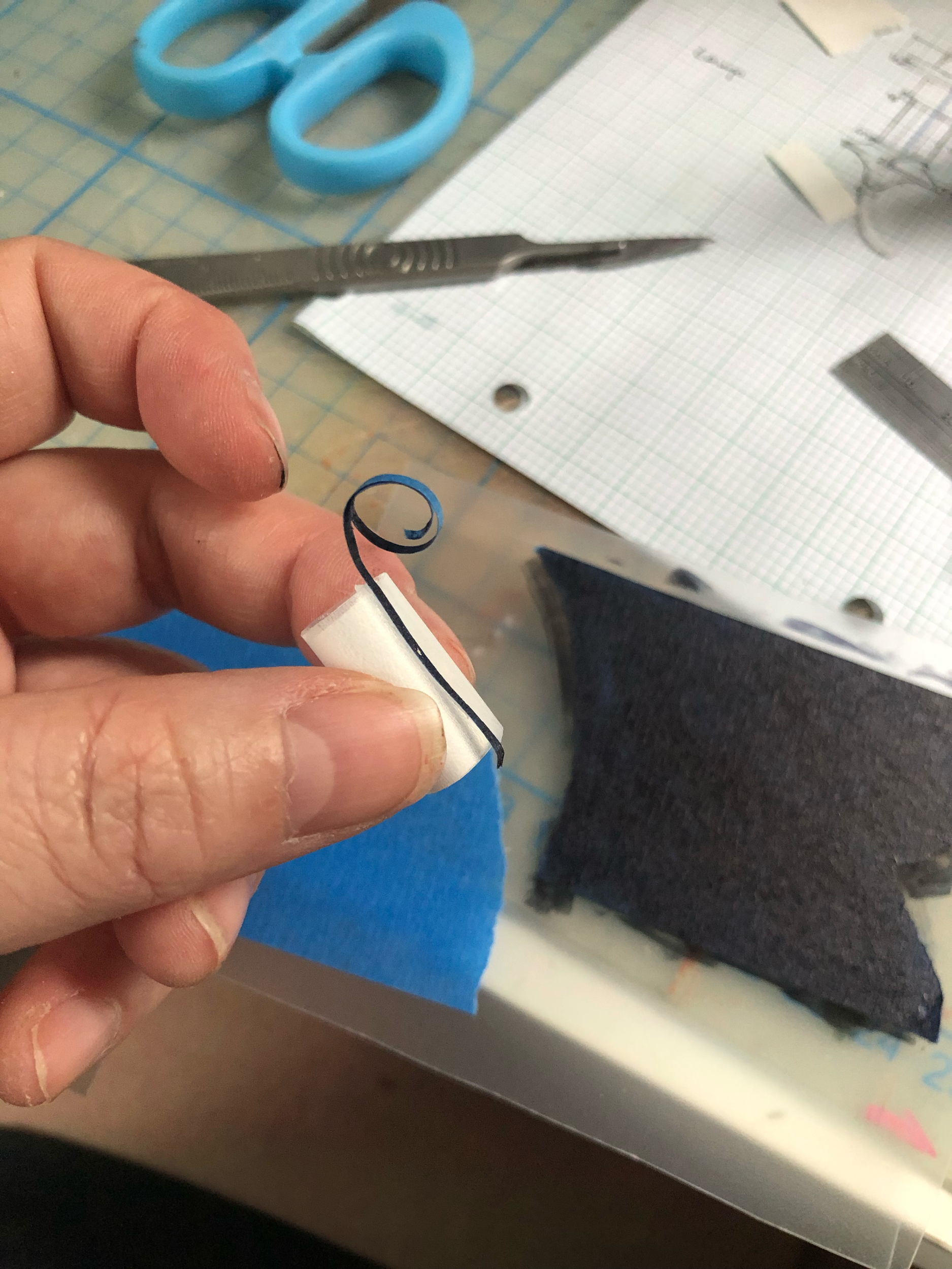 Making lamp from frosted plastic and painted tape strips