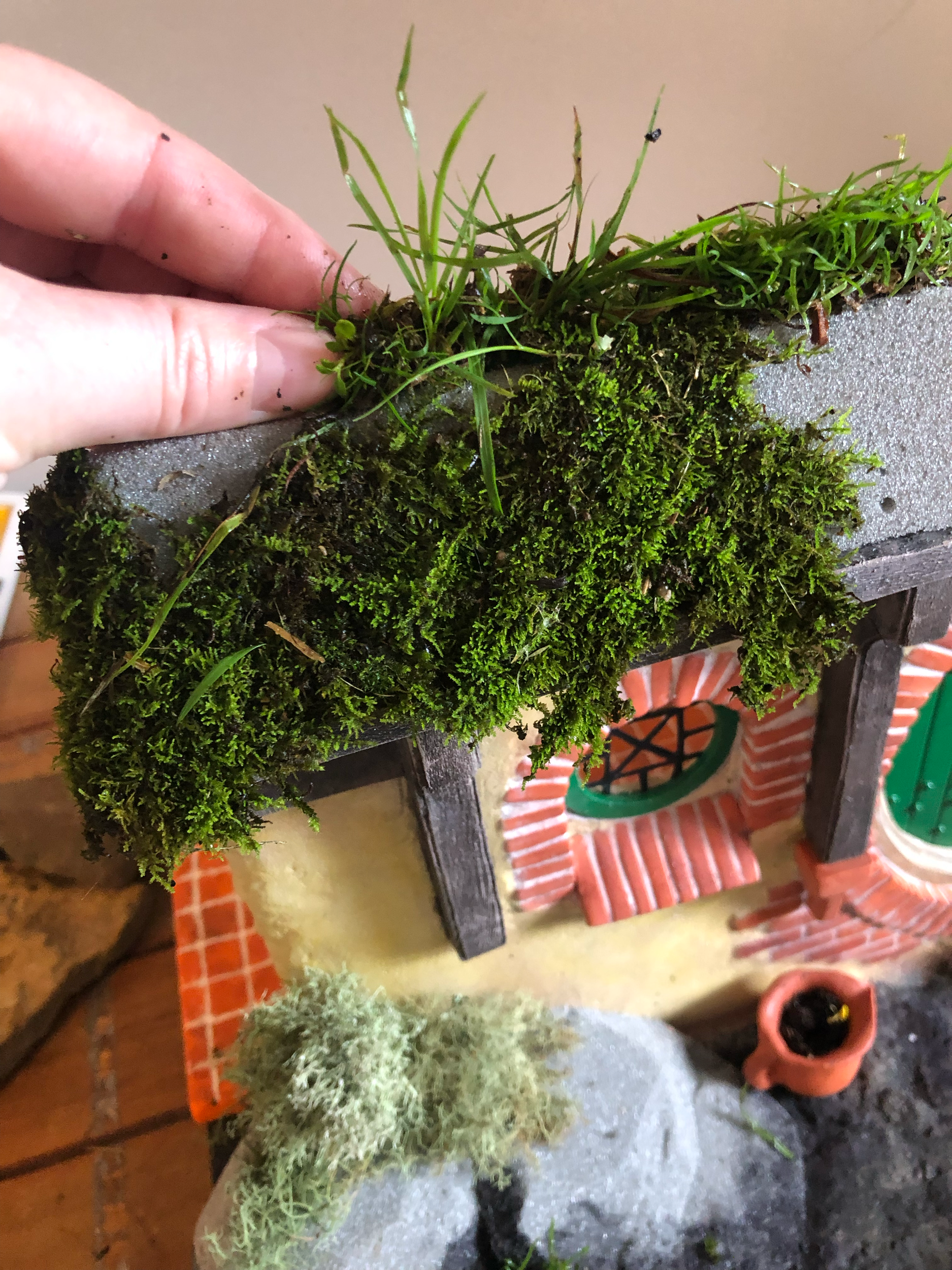 Dressing the mini set in foraged plant life
